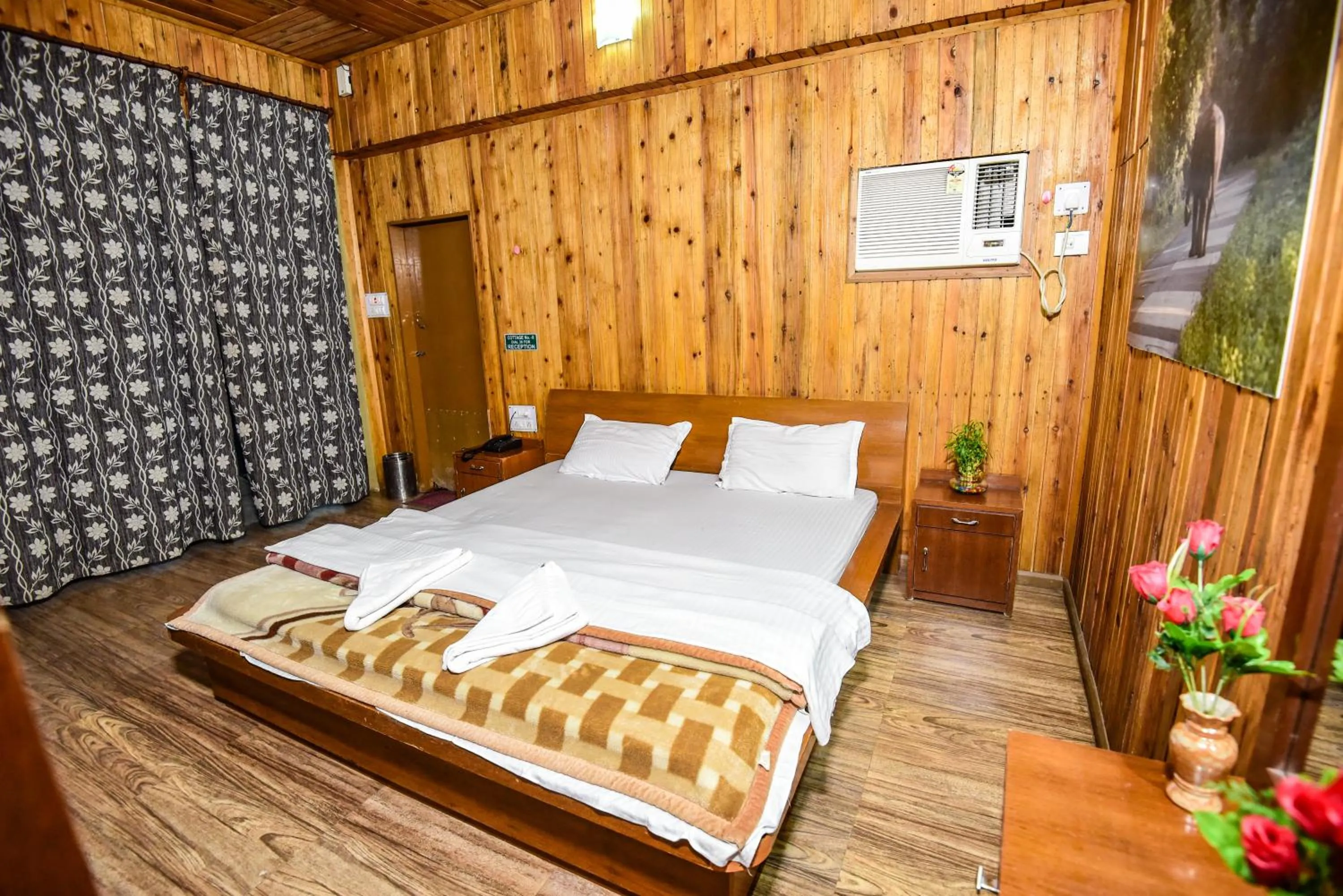 Bed in Aranya Jungle Resorts