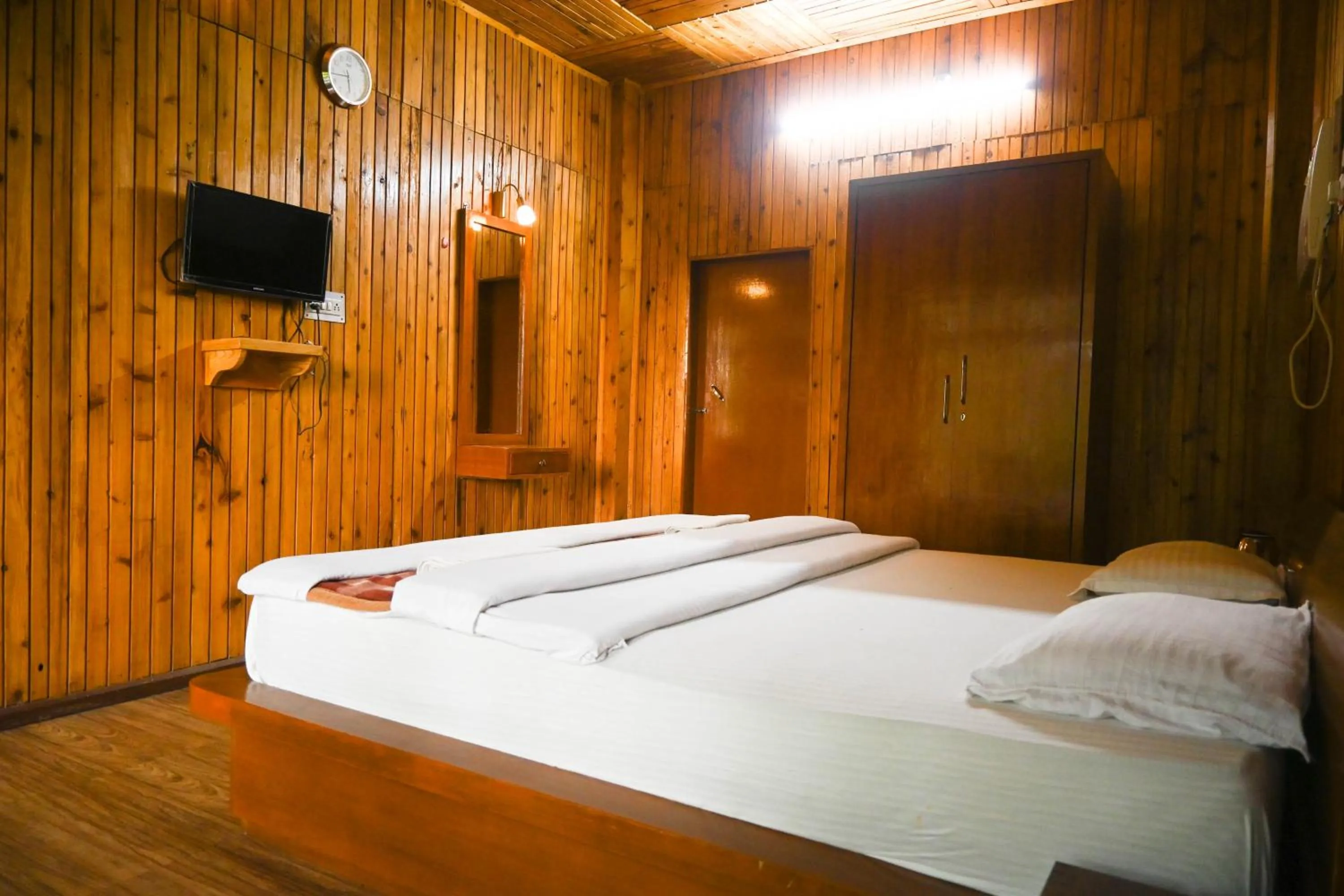 Bedroom in Aranya Jungle Resorts