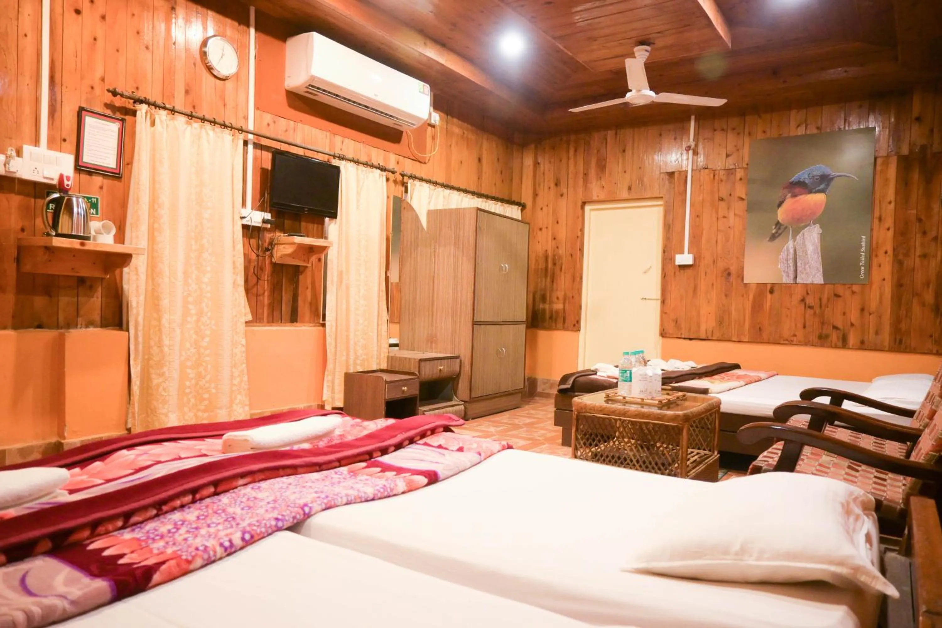 Bed in Aranya Jungle Resorts