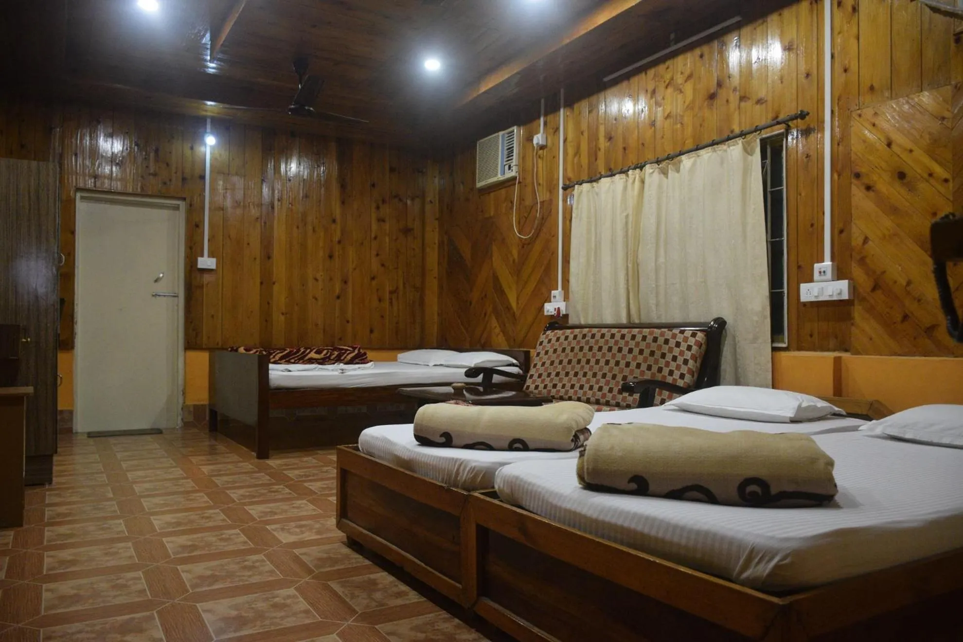 Photo of the whole room, Bed in Aranya Jungle Resorts
