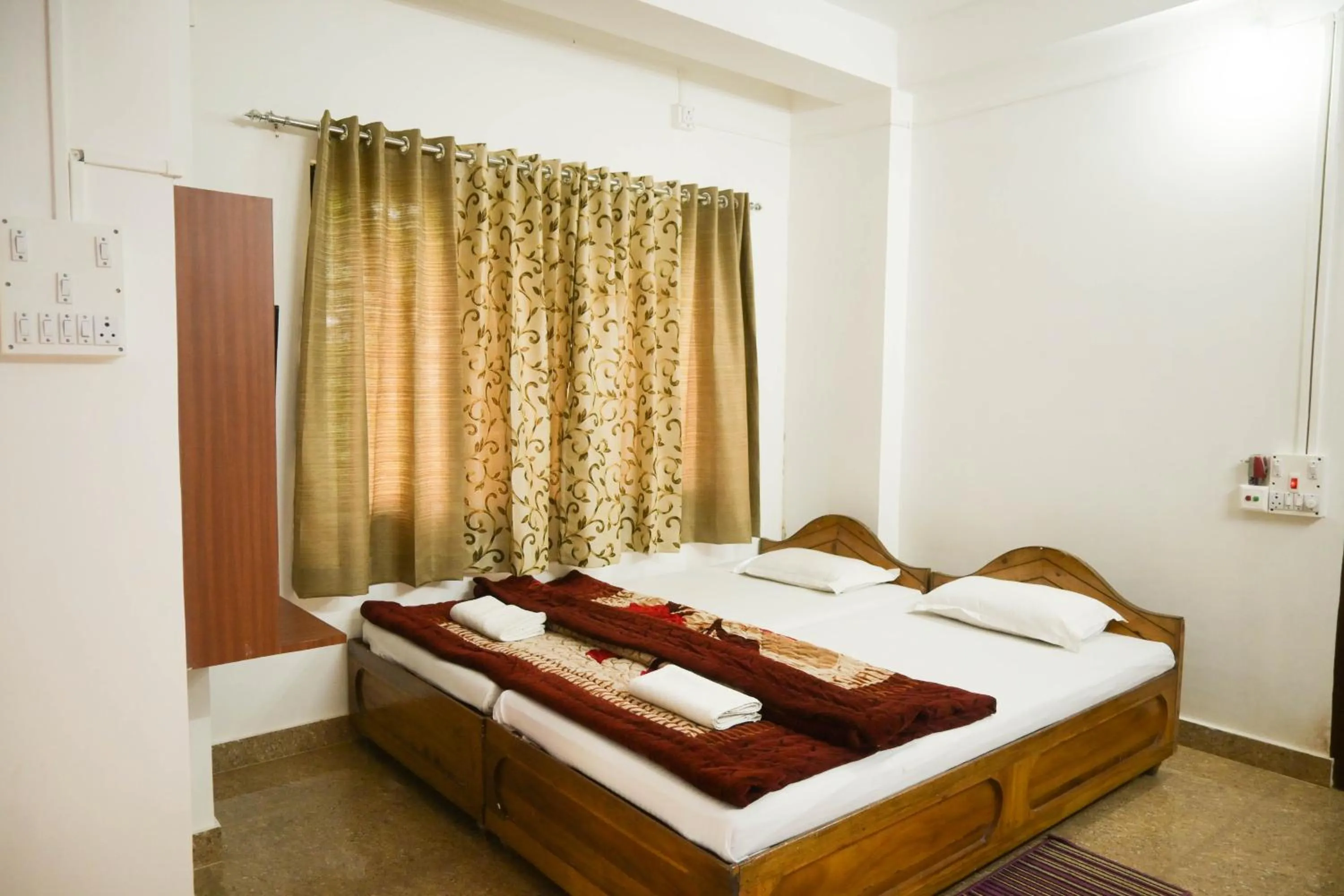Bed in Aranya Jungle Resorts