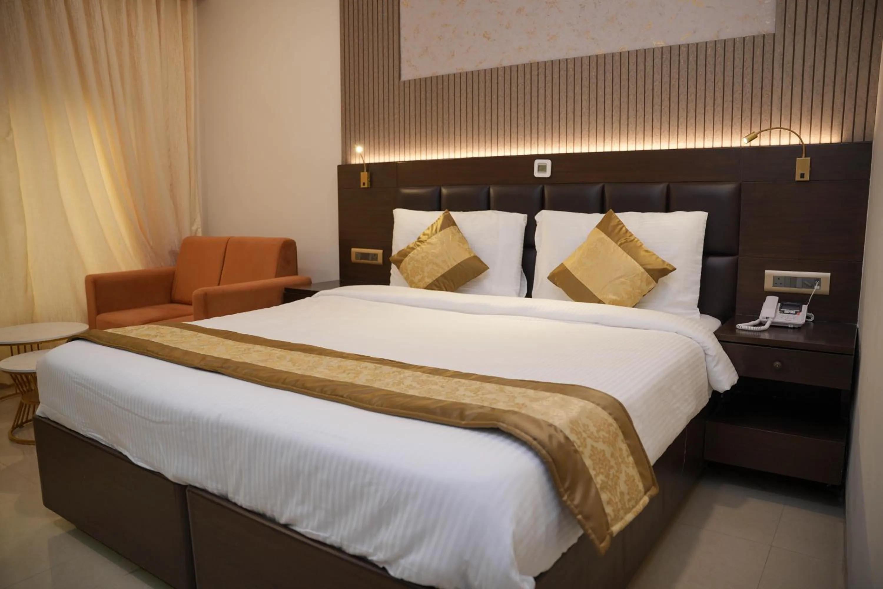 Bed in The Ontime Hotel, Bangalore