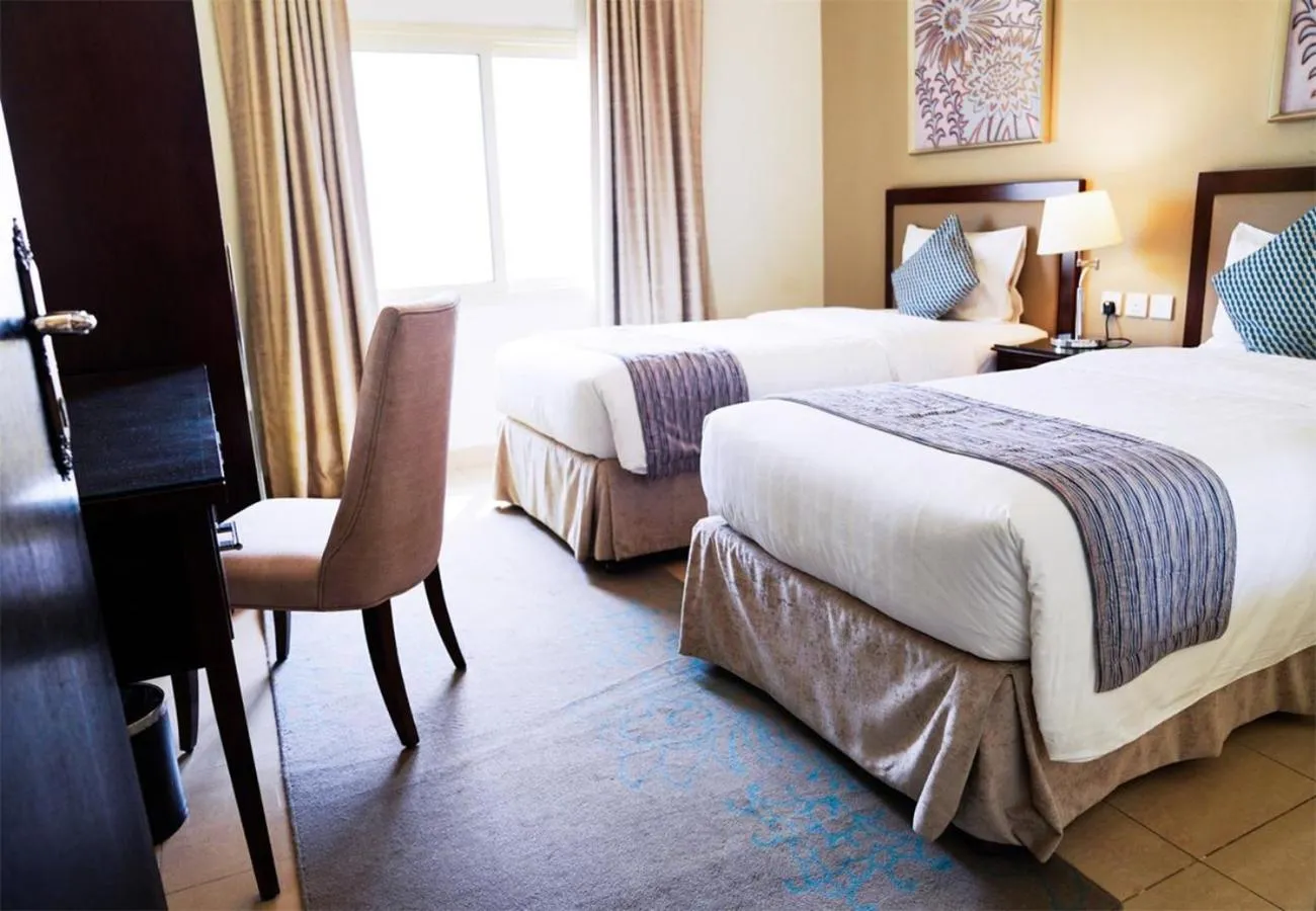 Bed in Taskeen Inn, Formerly Tulip Inn