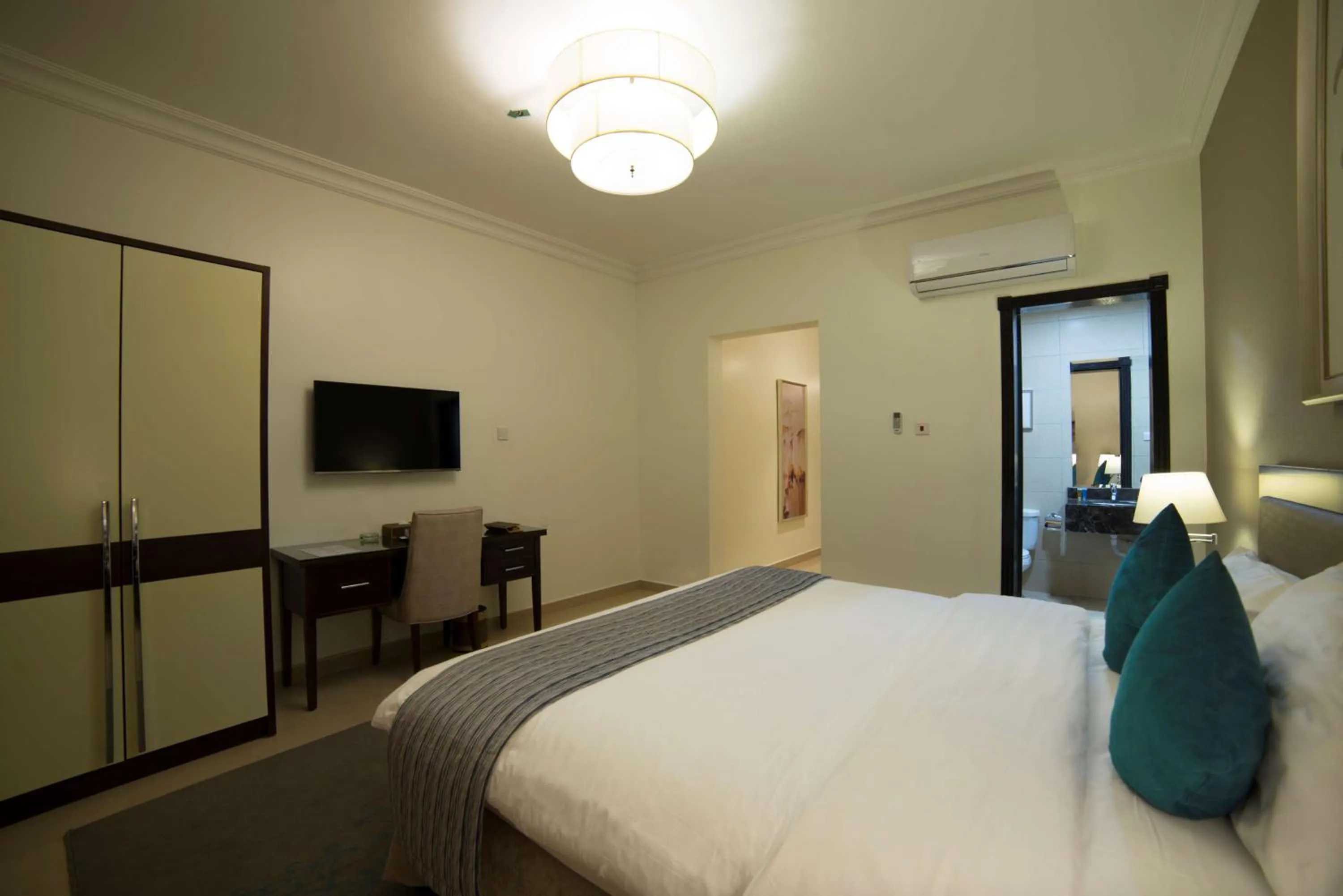 Photo of the whole room, Bed in Taskeen Inn, Formerly Tulip Inn