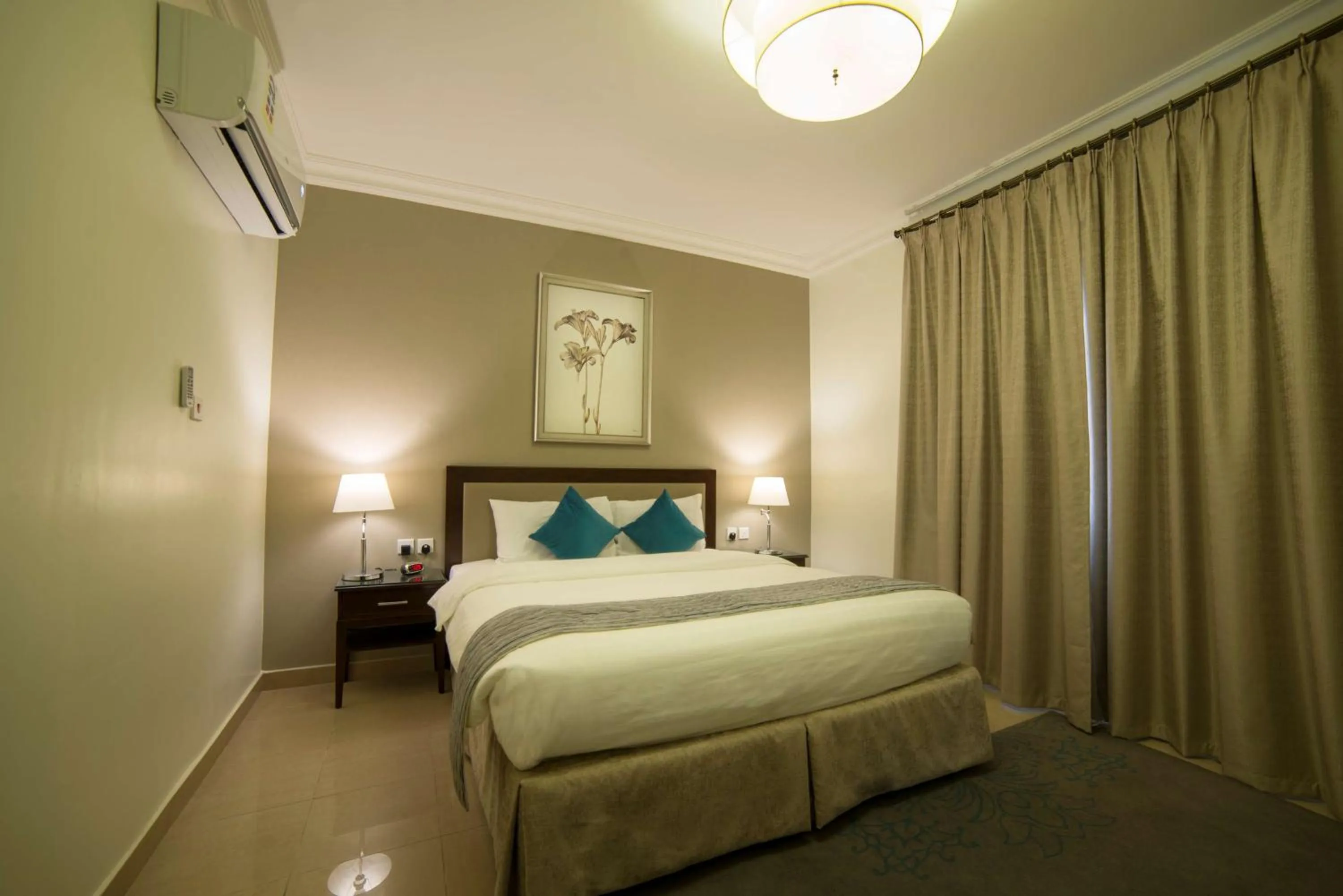 Photo of the whole room, Bed in Taskeen Inn, Formerly Tulip Inn