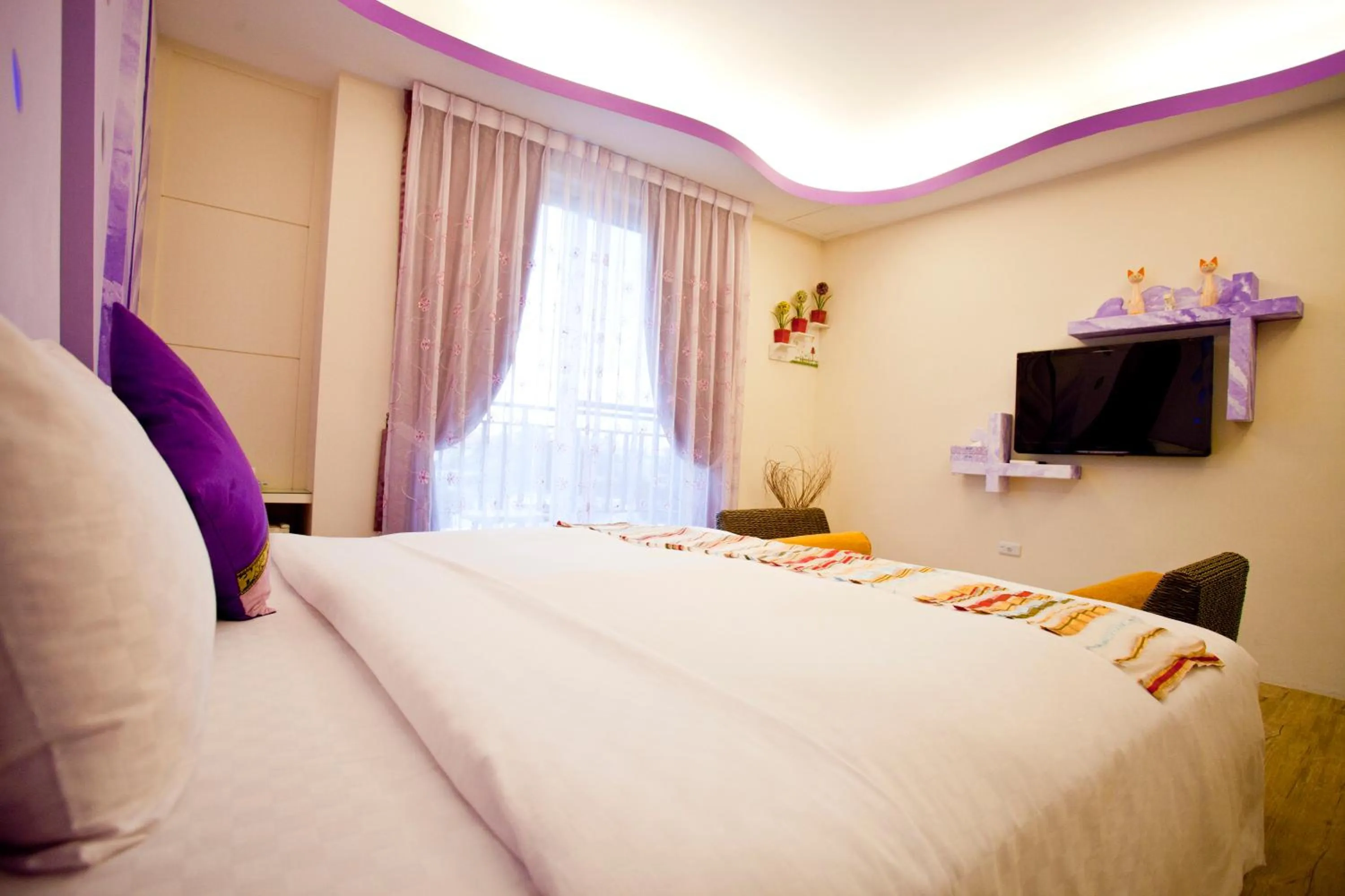 Bed in Millennium Inn