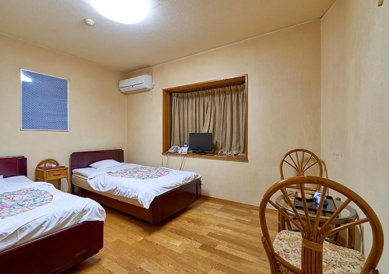 Bed in Shinwaka Lodge