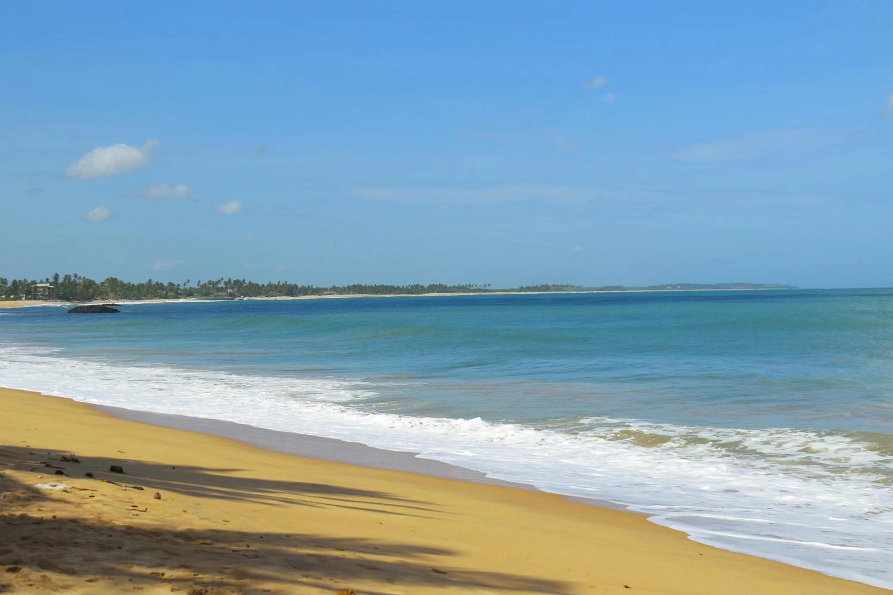 Beach in Coco Palm Villa and Cabanas
