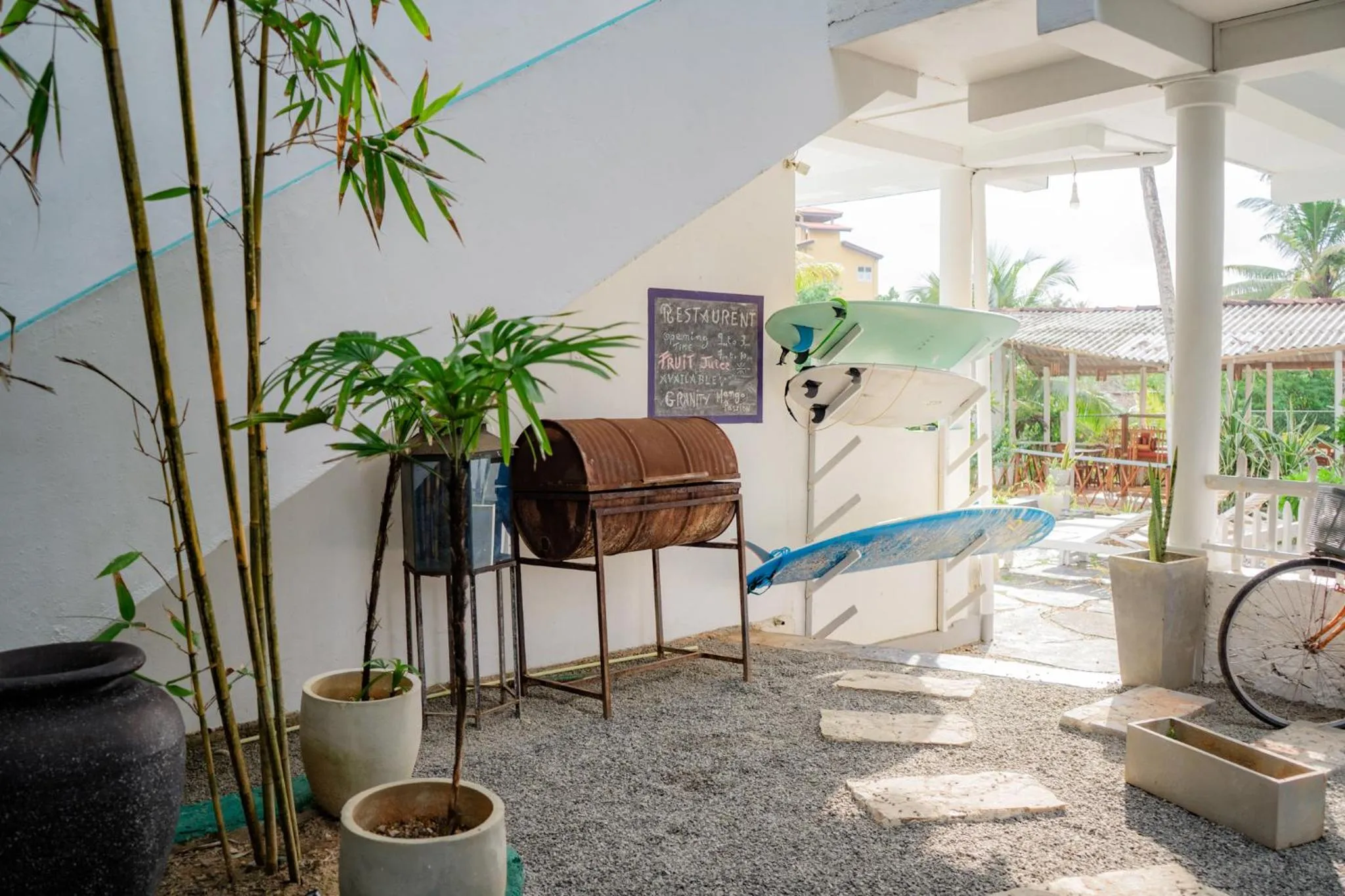 Property building in Asanka Surf House & Restaurant with pool