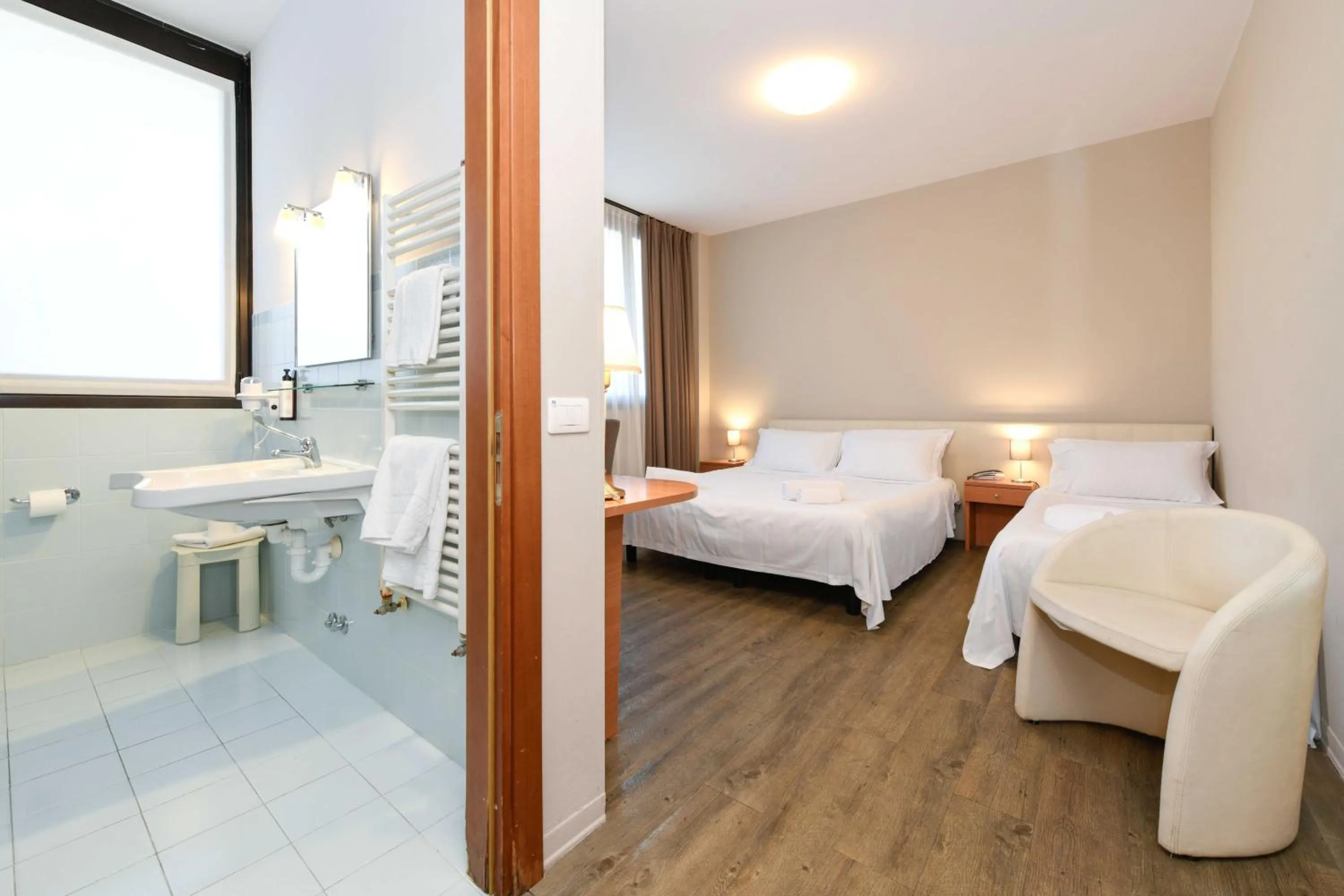 Toilet, Bed in Hotel Garda