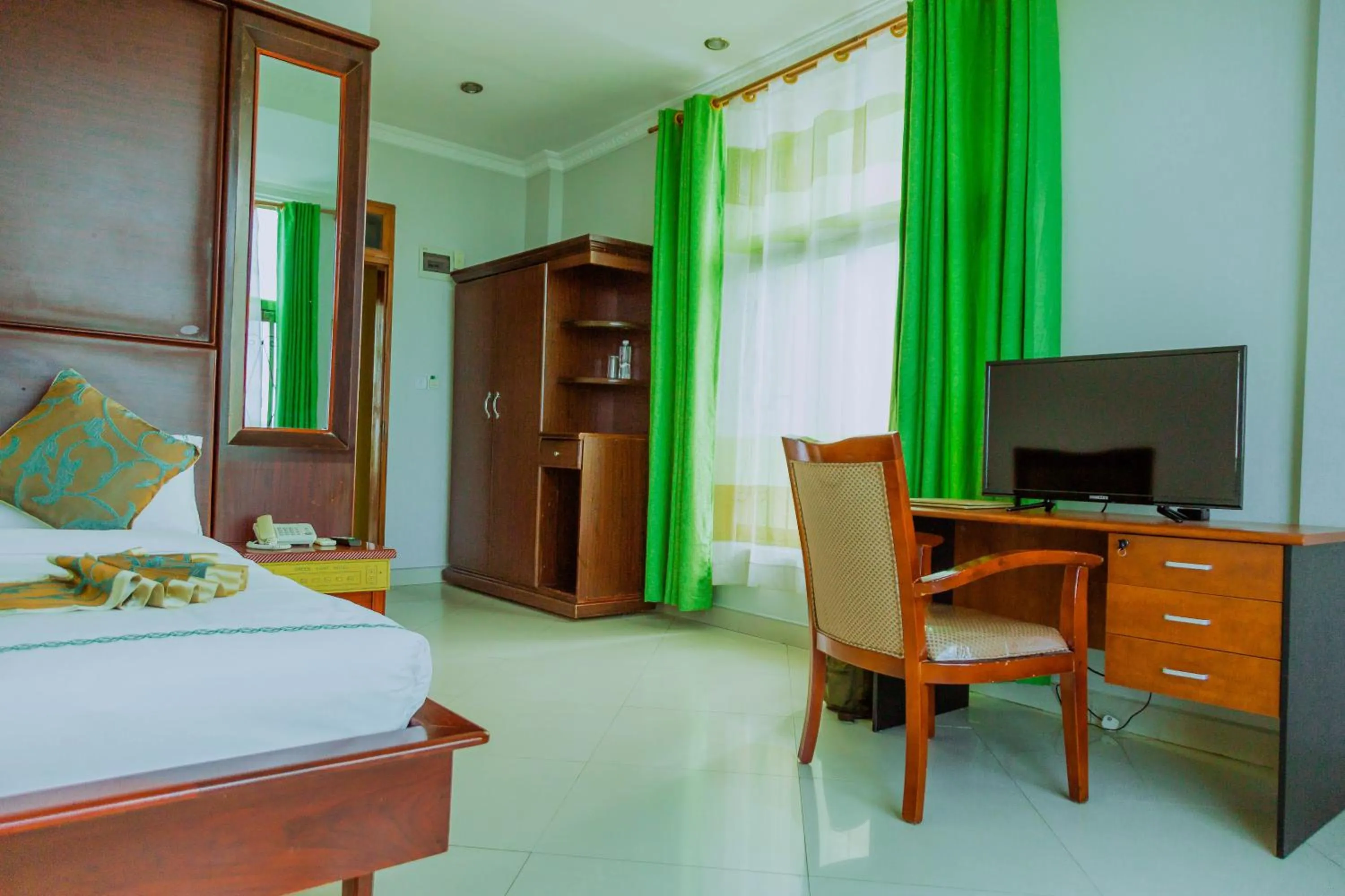 Bed in Greenlight Hotel