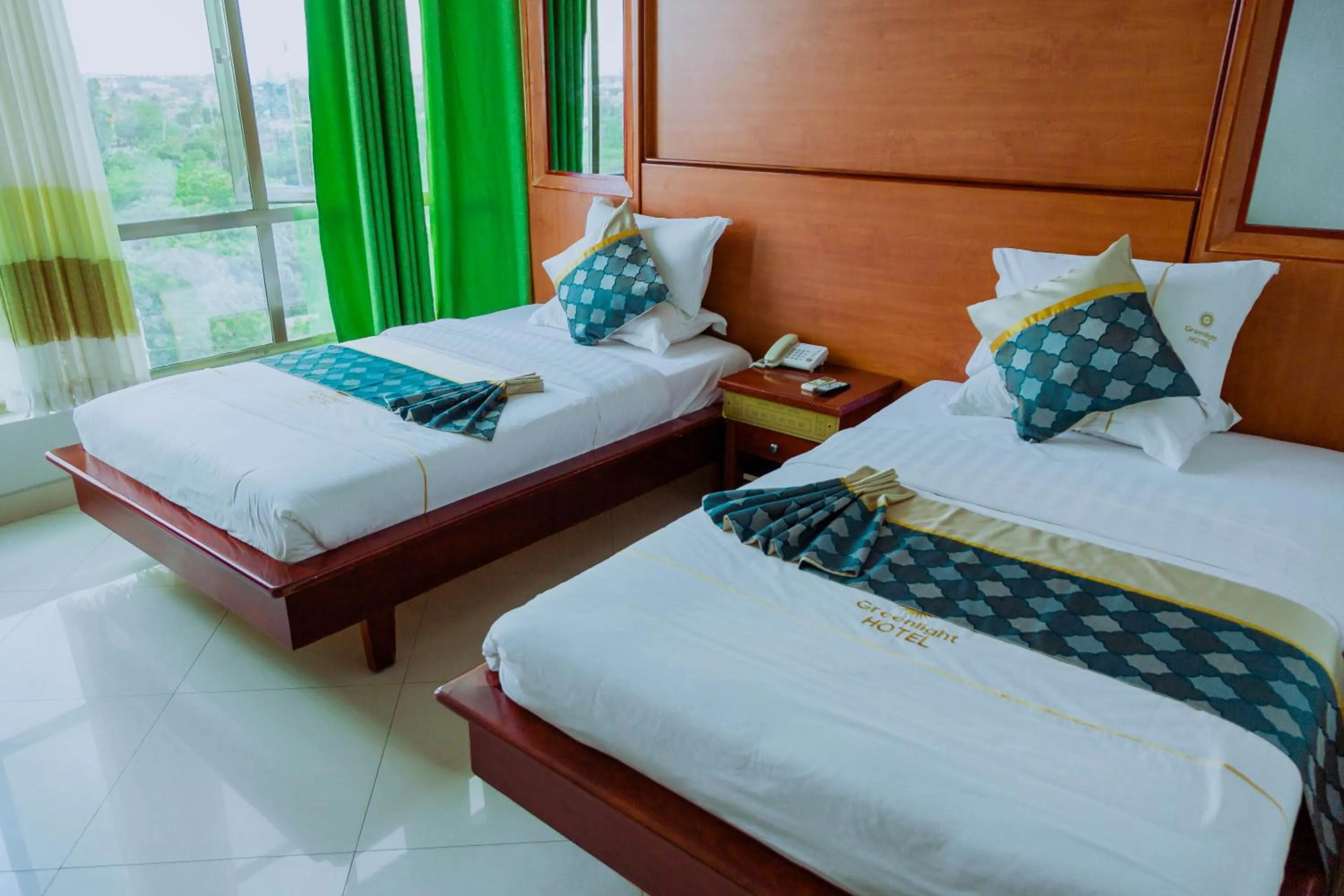 Bed in Greenlight Hotel