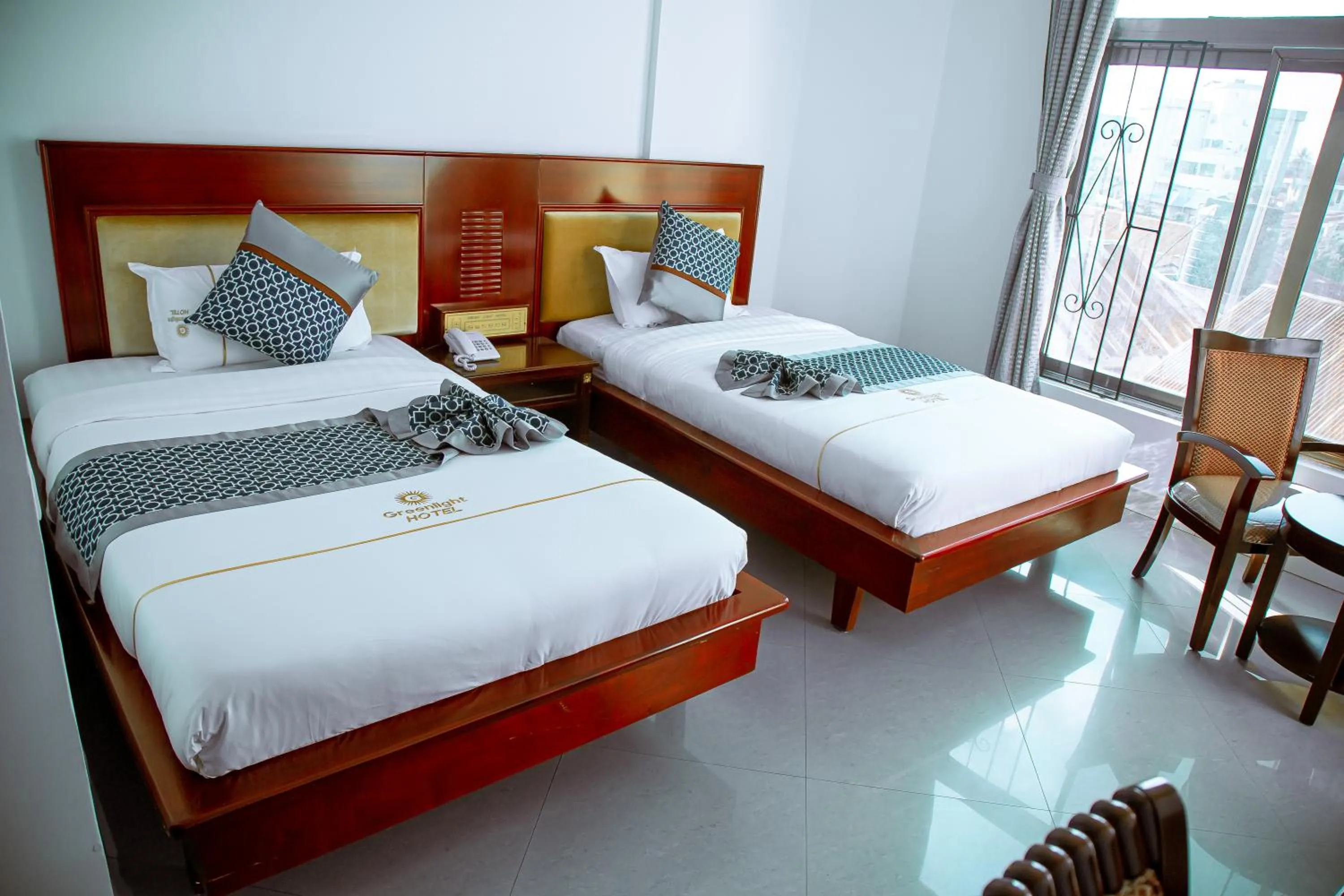 Bed in Greenlight Hotel