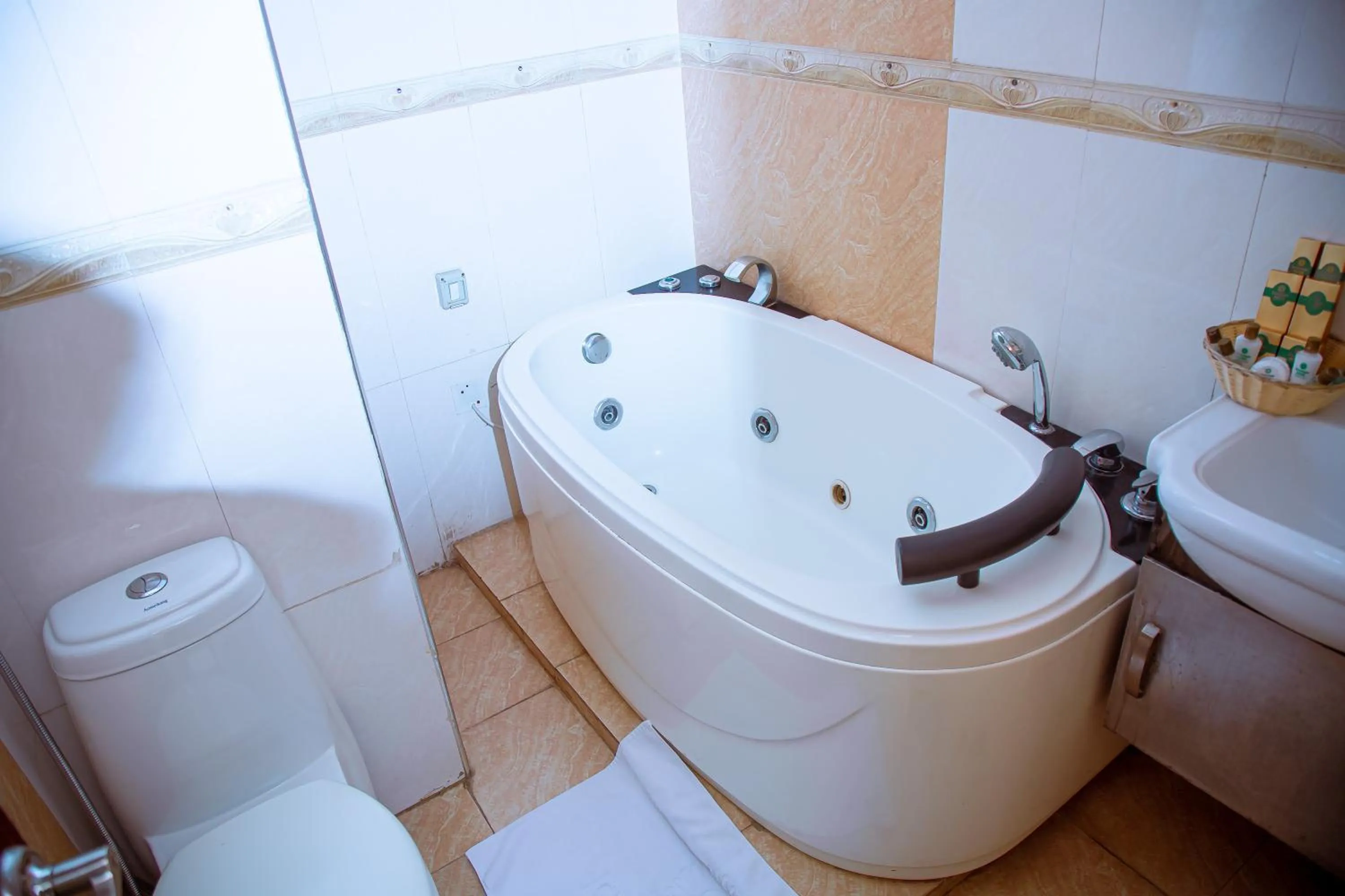 Toilet in Greenlight Hotel