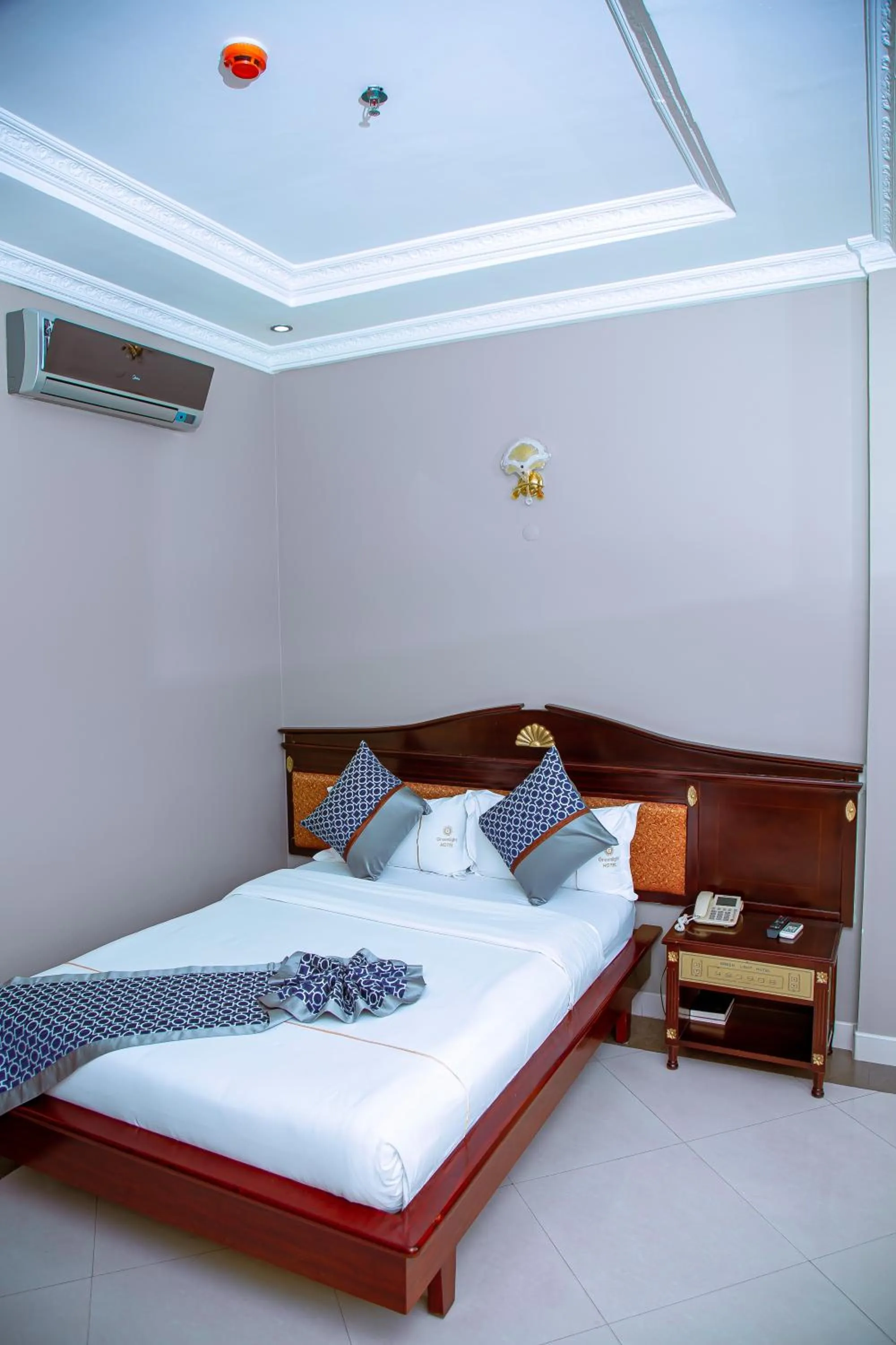 Bed in Greenlight Hotel