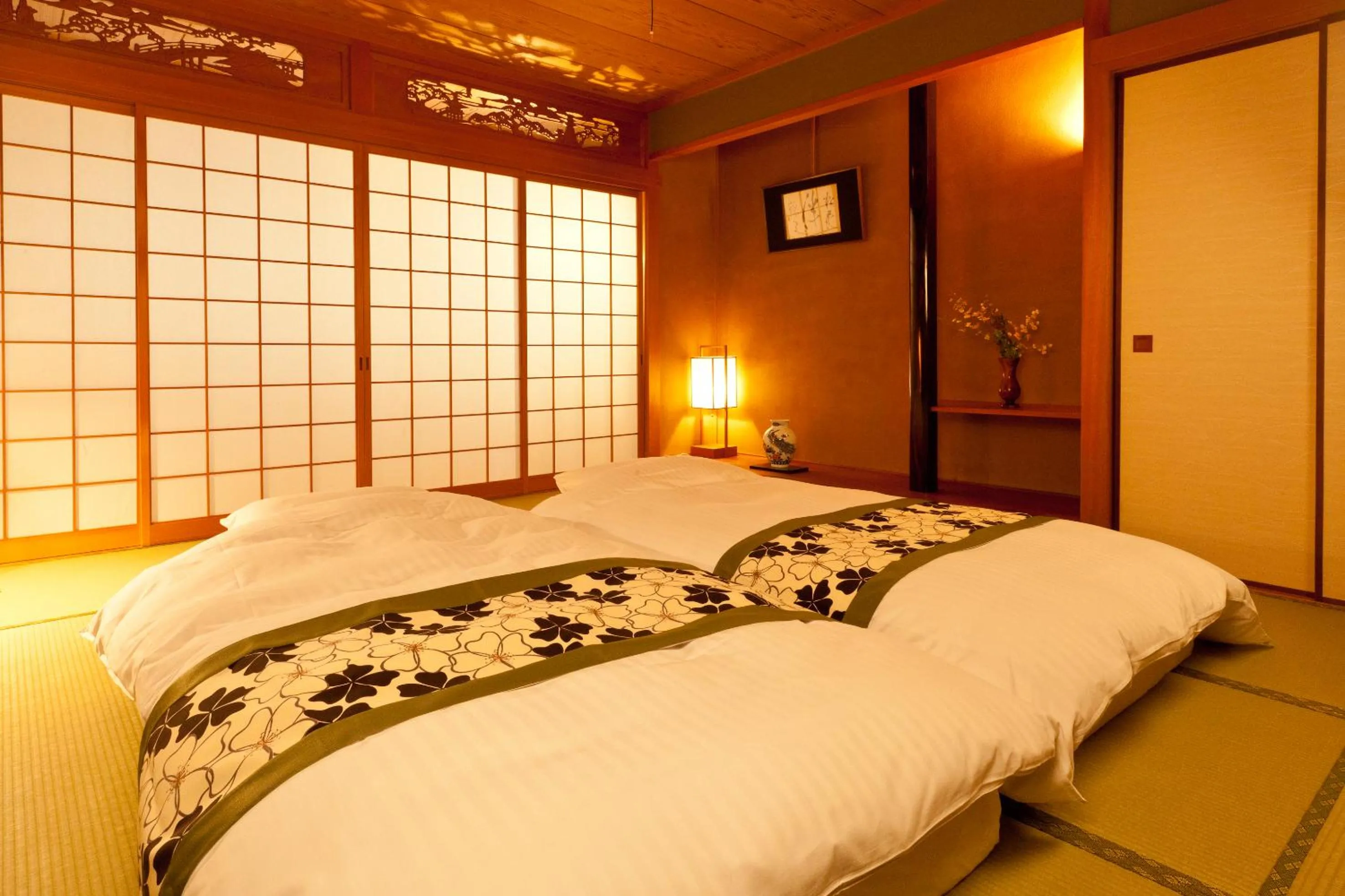 Bed in Hotel Takasago