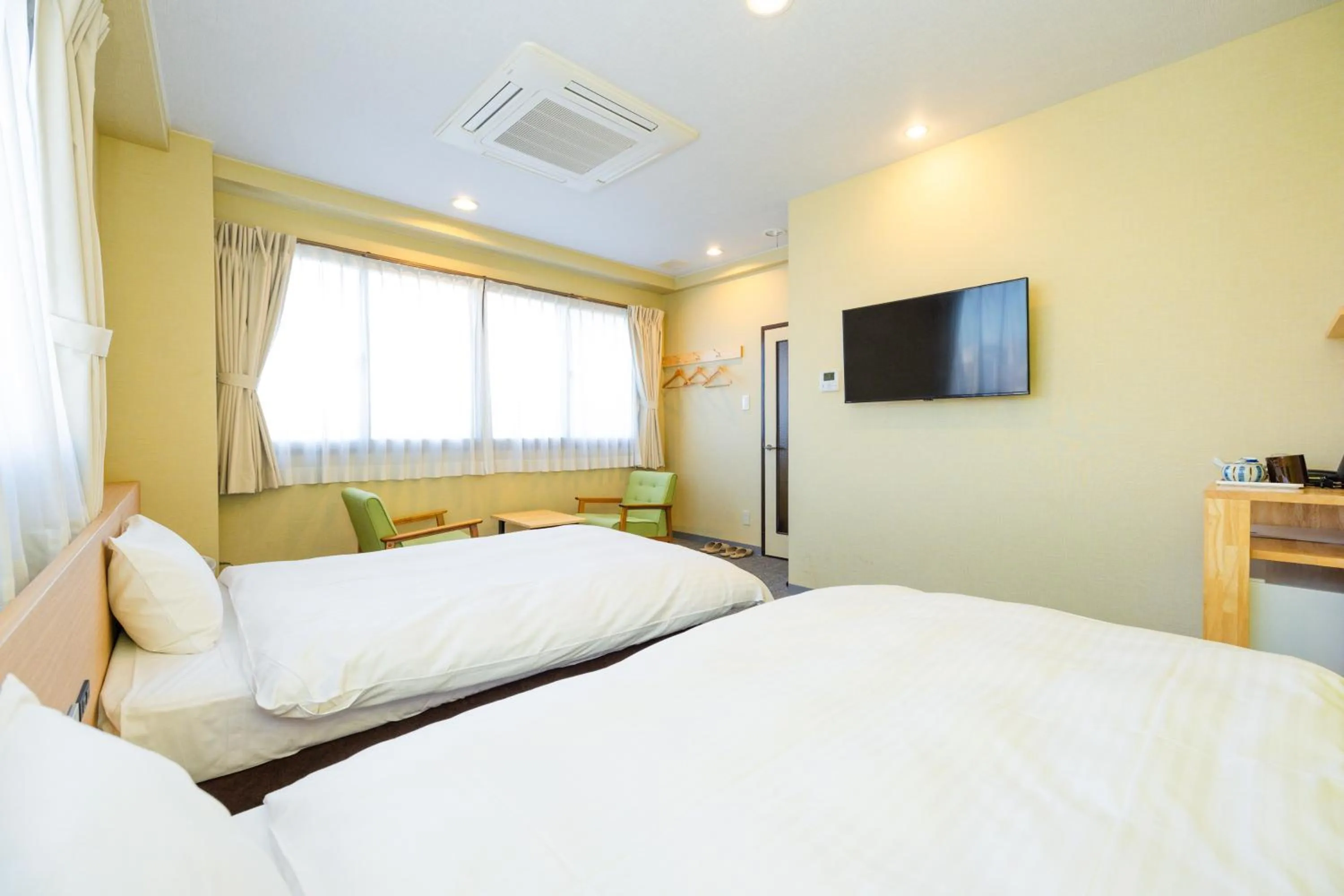 Bed in Hotel Takasago