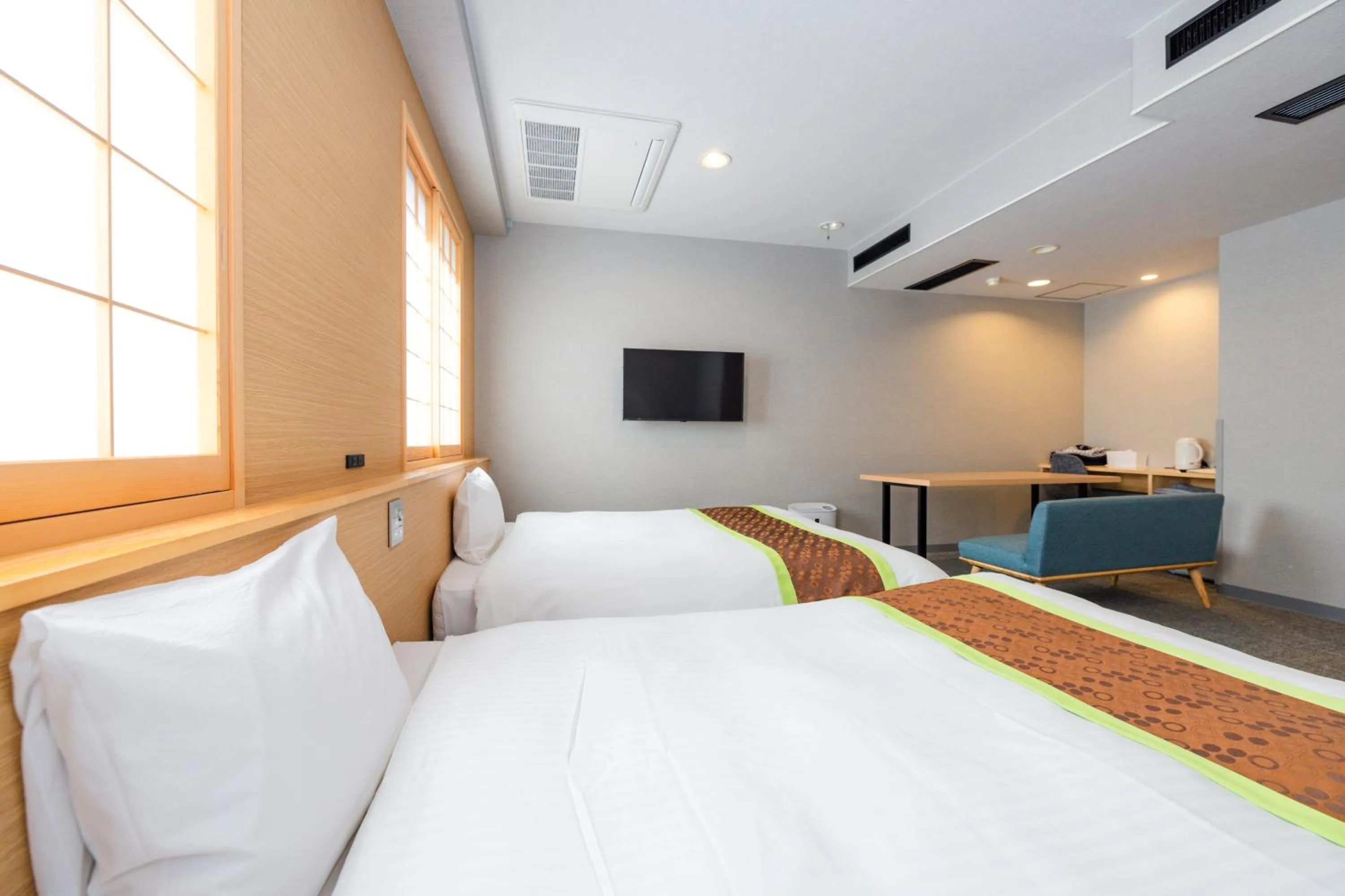 Bed in Hotel Takasago