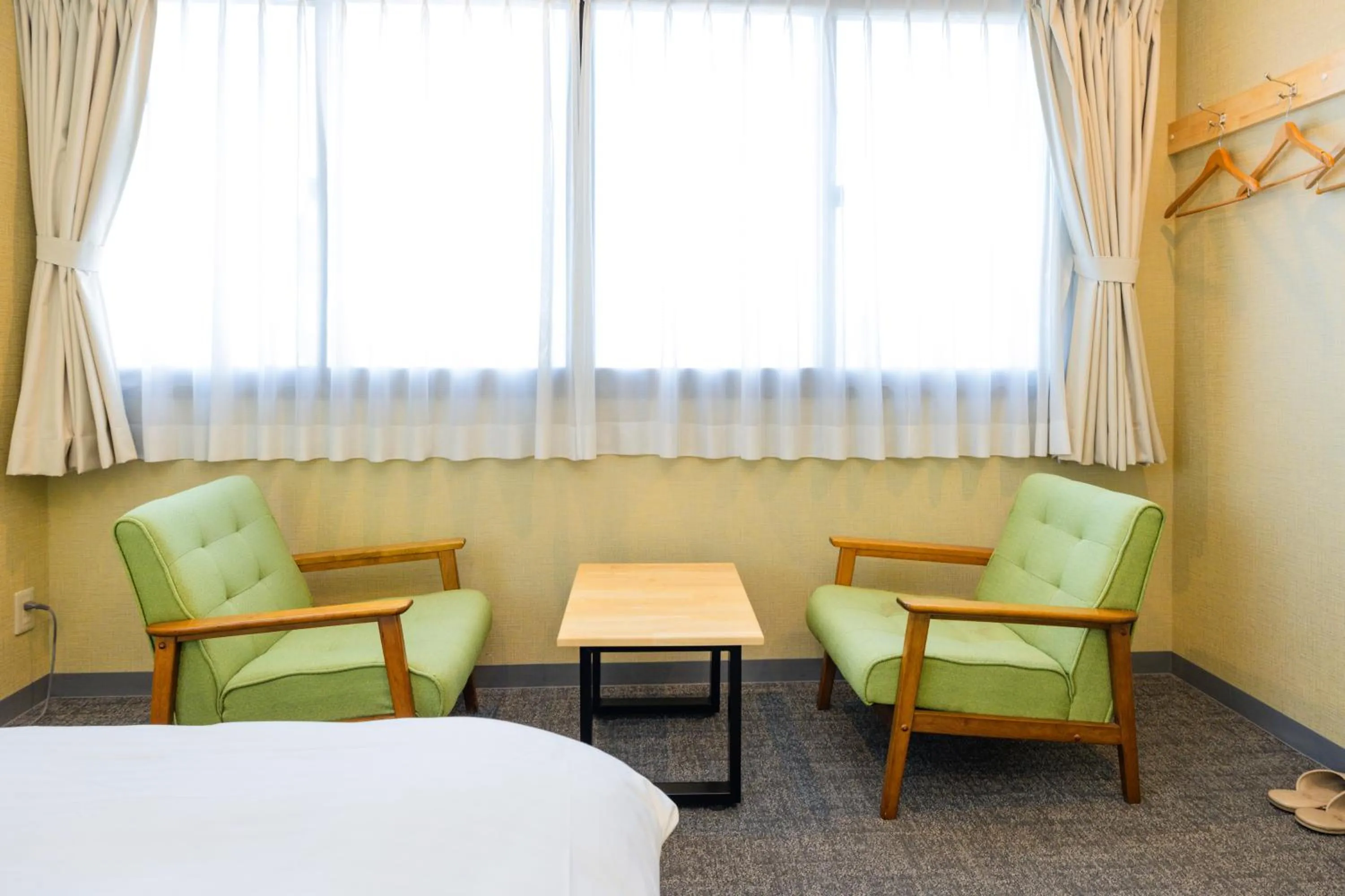 Bed in Hotel Takasago