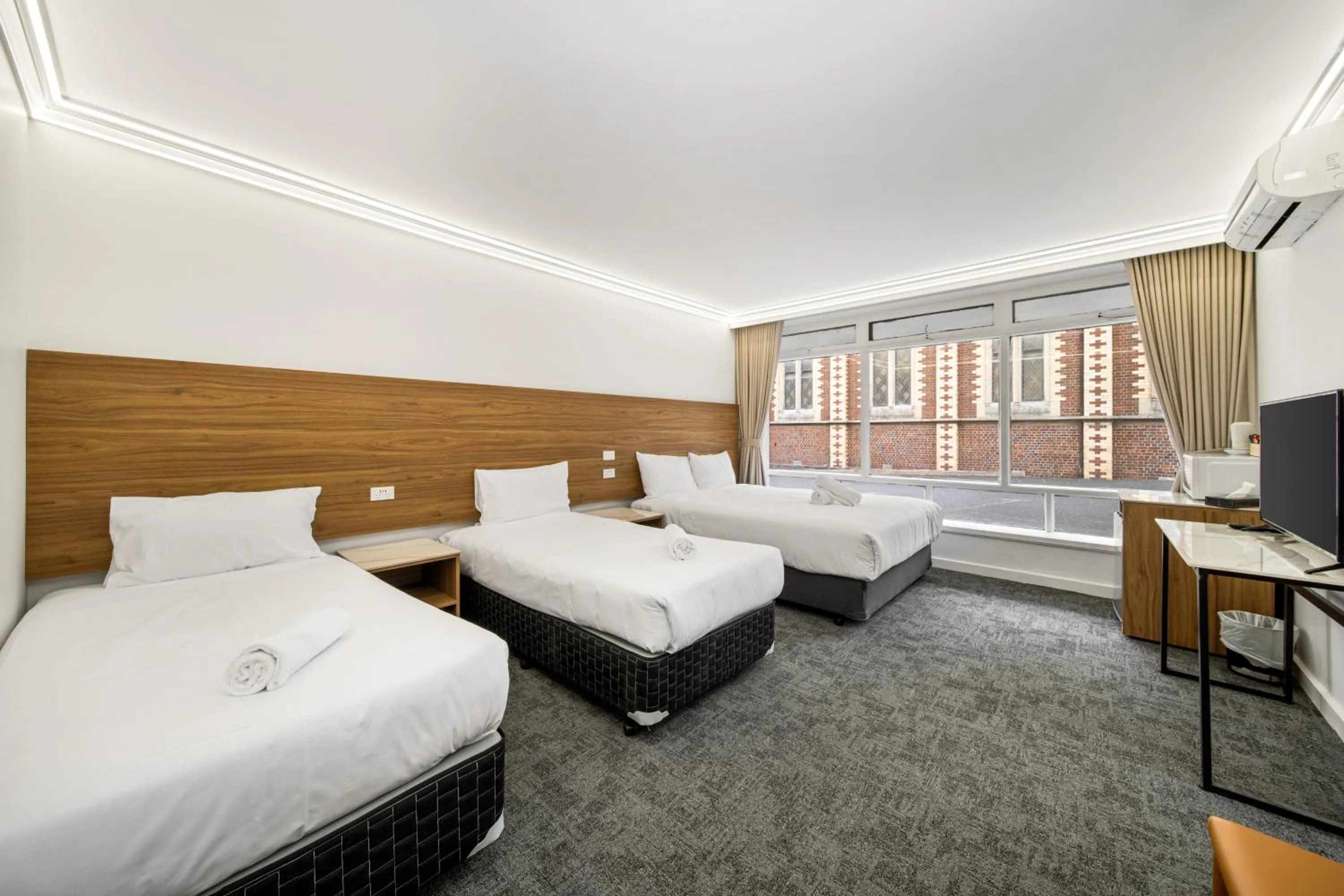 Bed in Kingsway Motel Geelong