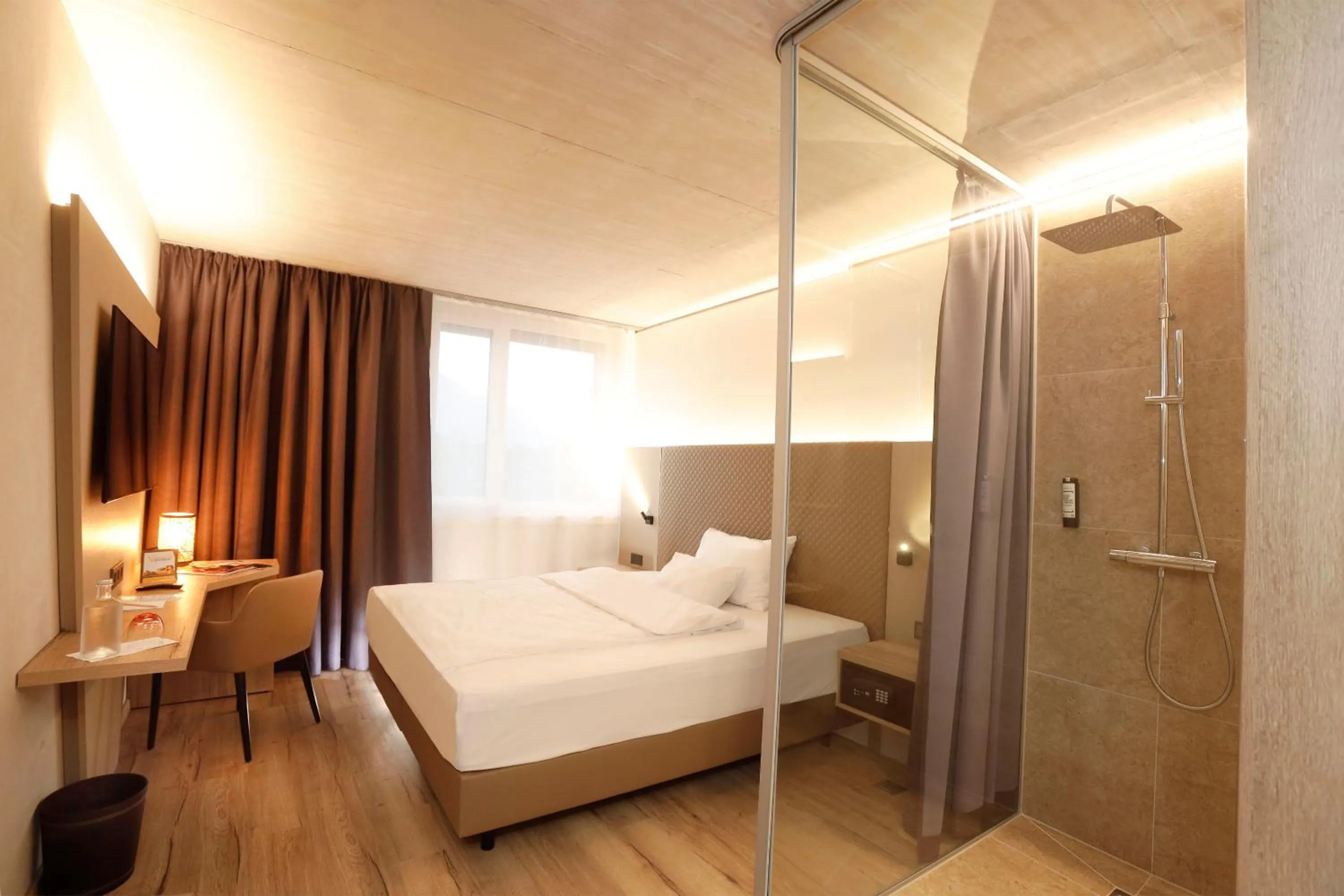 Bed in Hotel im Zentrum für Visionen