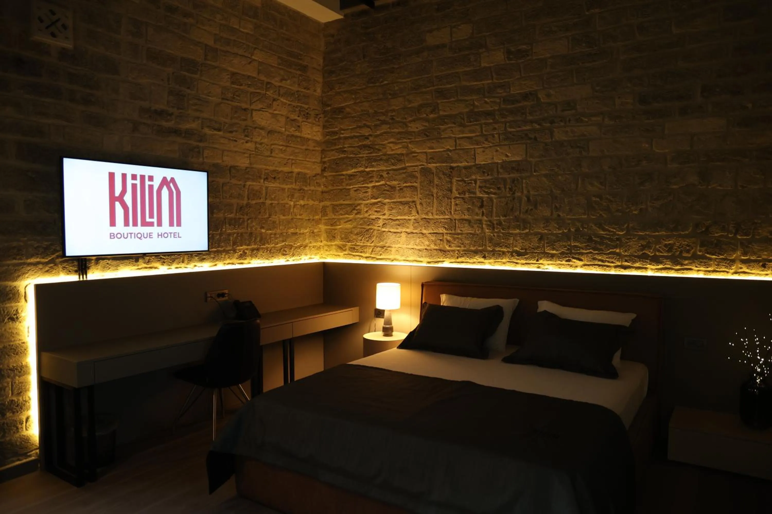 Bed in Kilim Boutique Hotel