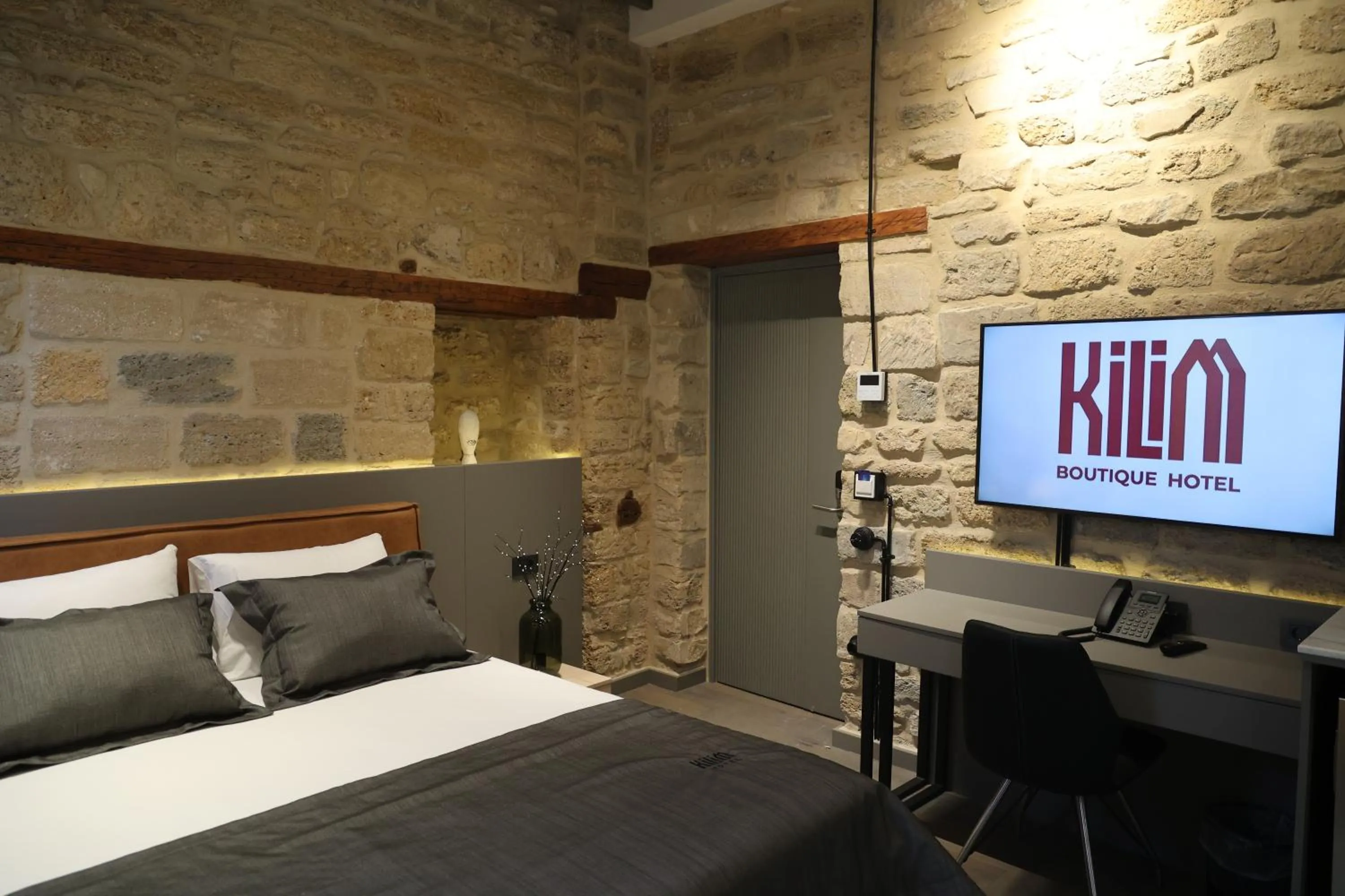 Bed in Kilim Boutique Hotel