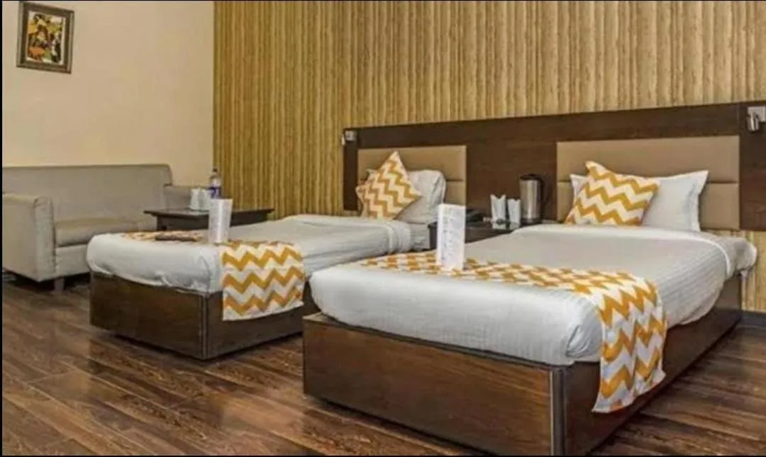 Bedroom, Bed in Riddhi Inn