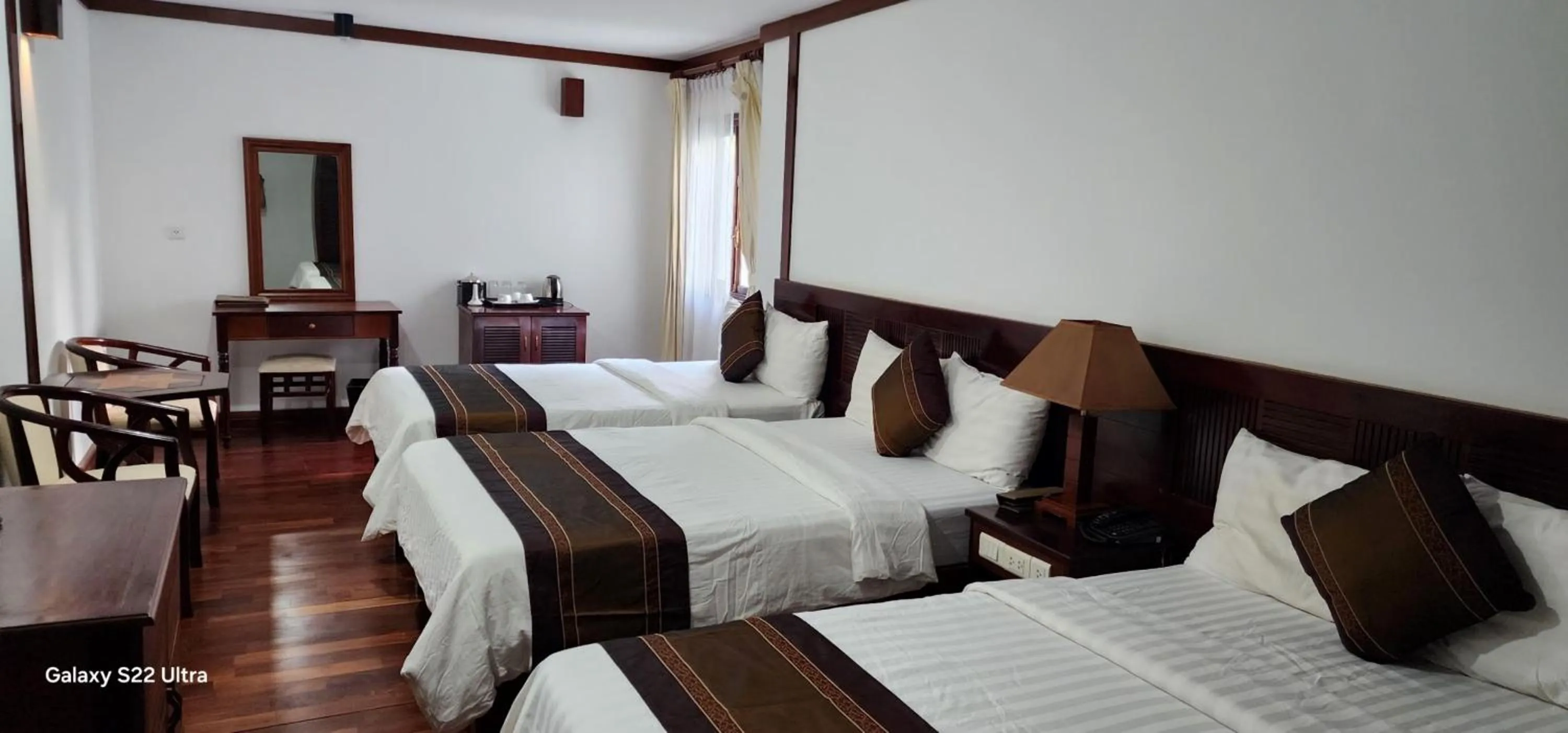 Photo of the whole room, Bed in EG Paradise Angkor Villa Hotel