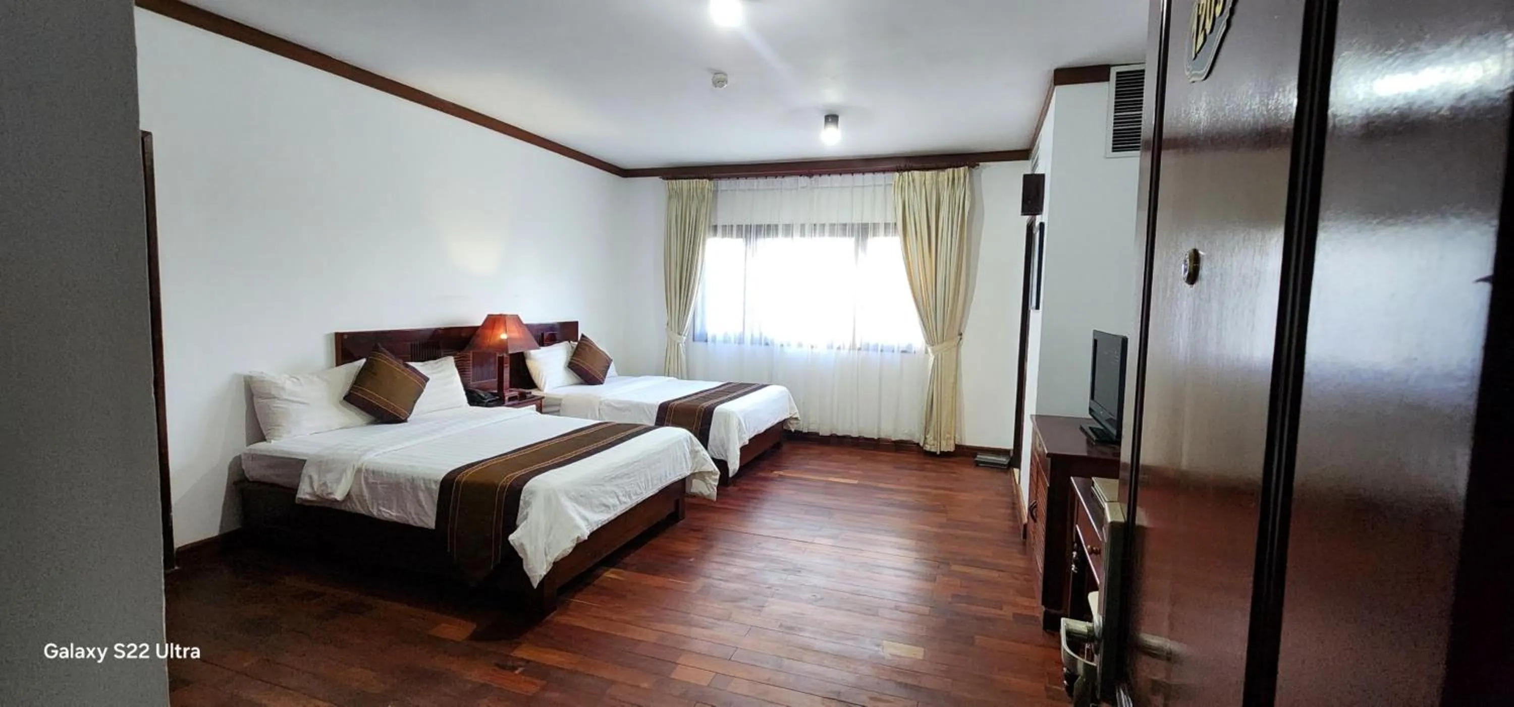 Photo of the whole room, Bed in EG Paradise Angkor Villa Hotel