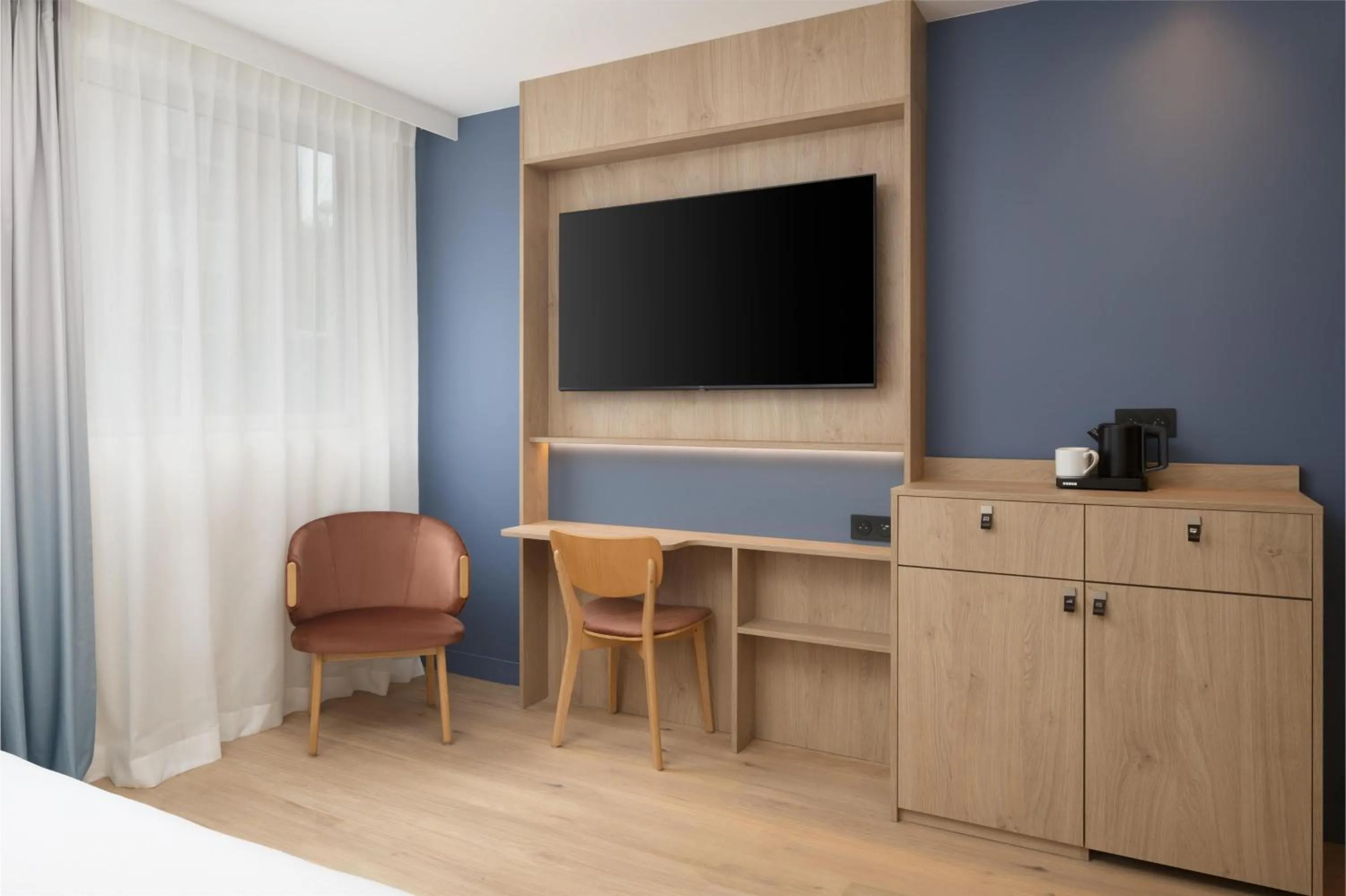 Bedroom in Hampton By Hilton Paris Charles De Gaulle Airport