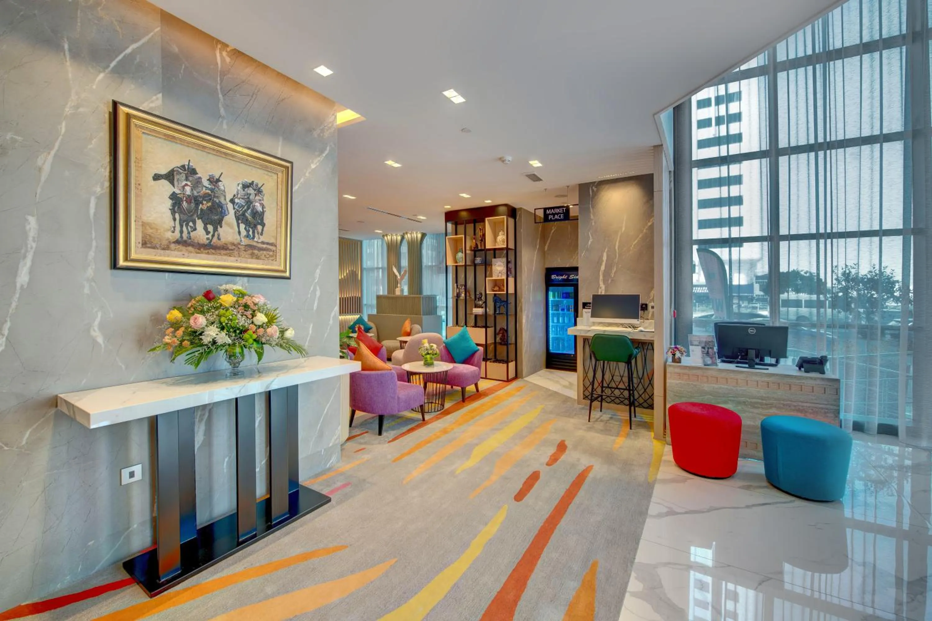 Lobby or reception in La Quinta by Wyndham Abu Dhabi Al Wahda