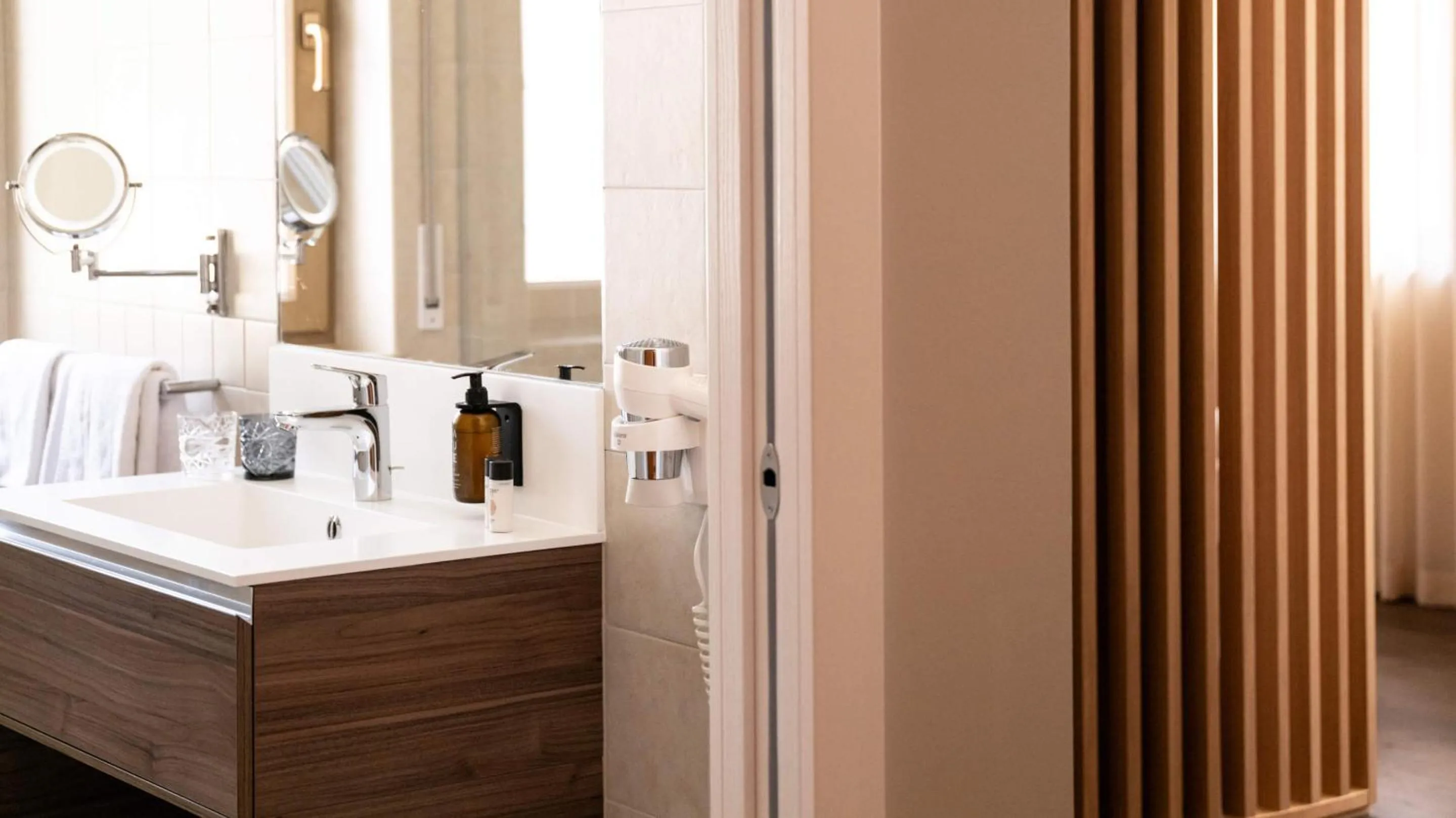 Bathroom in Flora Hotel & Suites