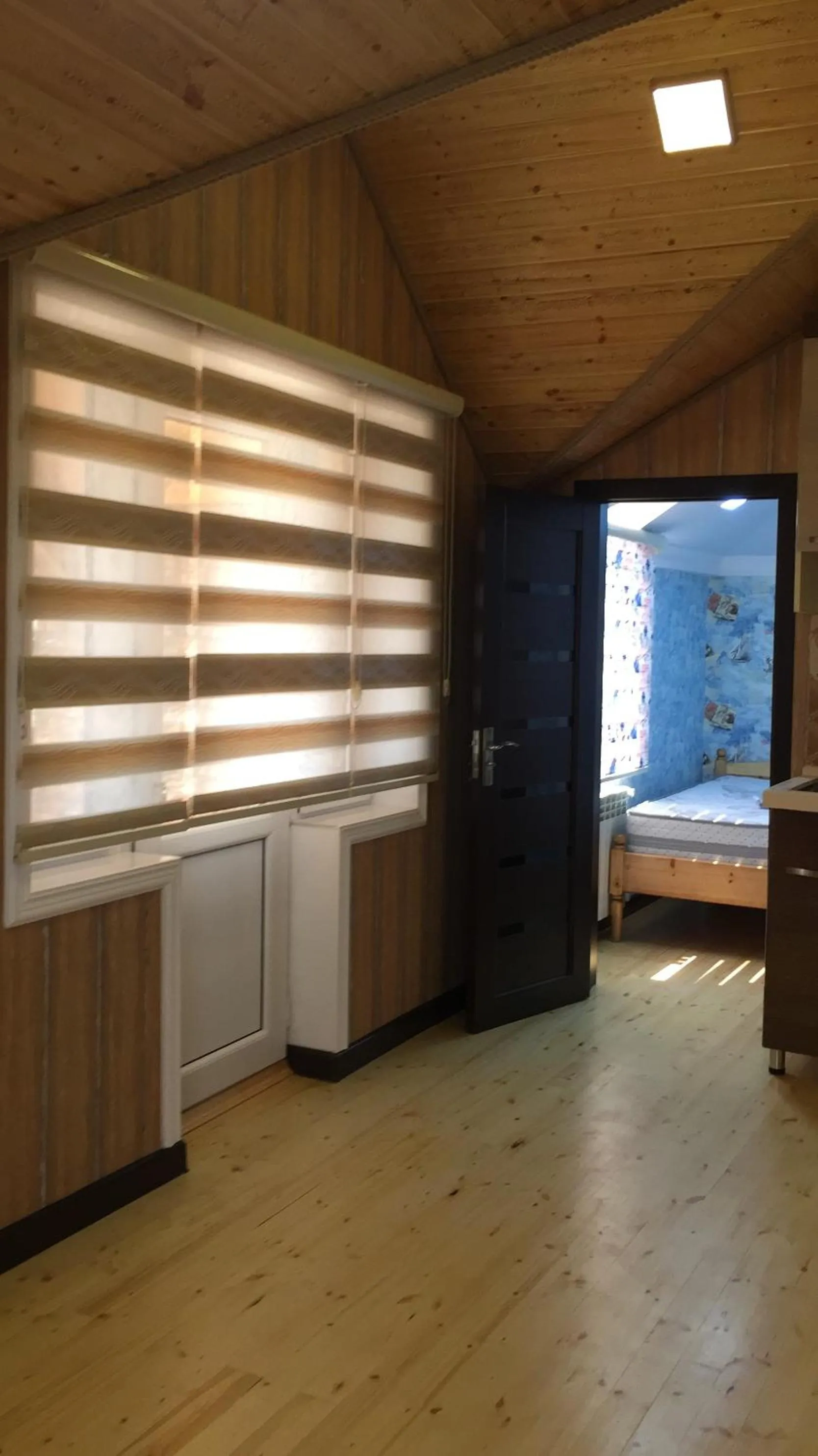 Communal lounge/ TV room in Hasanovs Villa