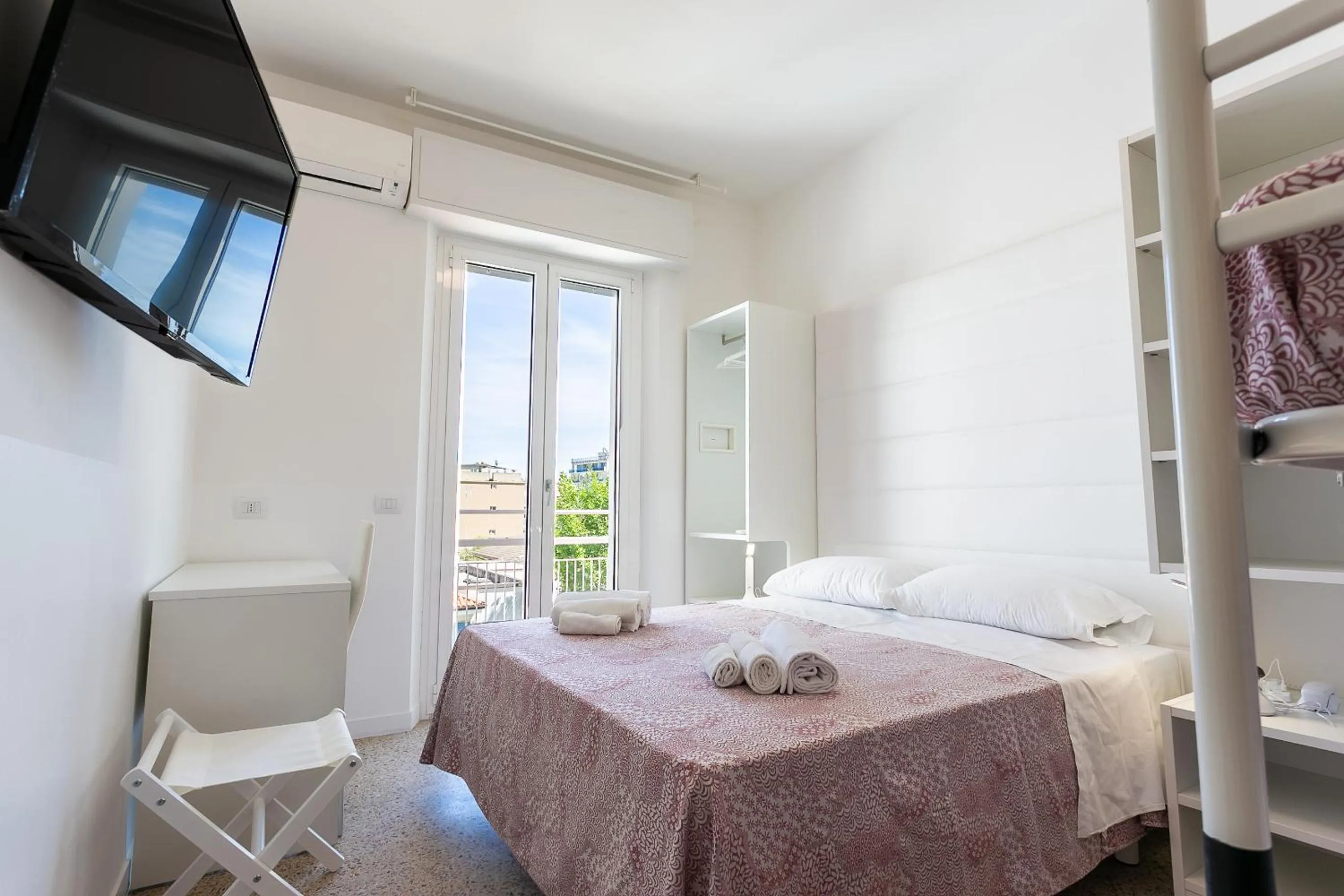 Bed in Hotel Ninfea Cattolica
