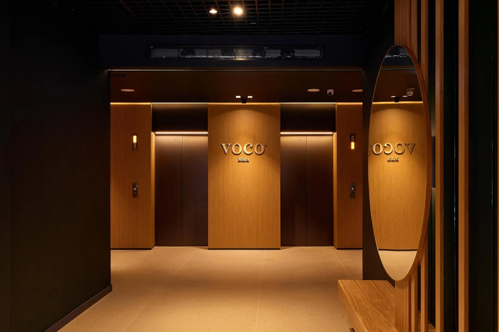 Lobby or reception in voco Malta by IHG