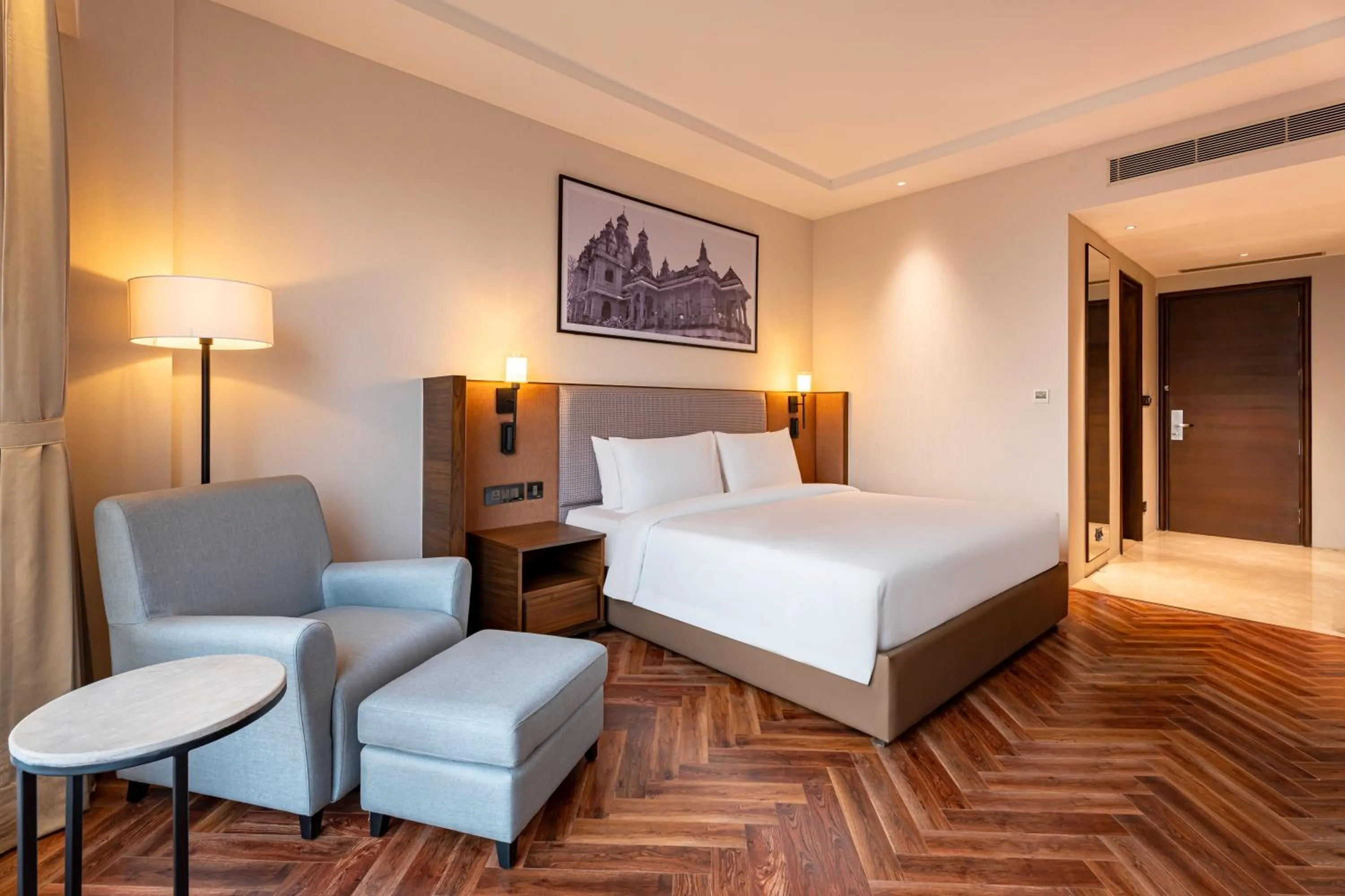 Bed in Grand Mirage Dhanbad, a member of Radisson Individuals