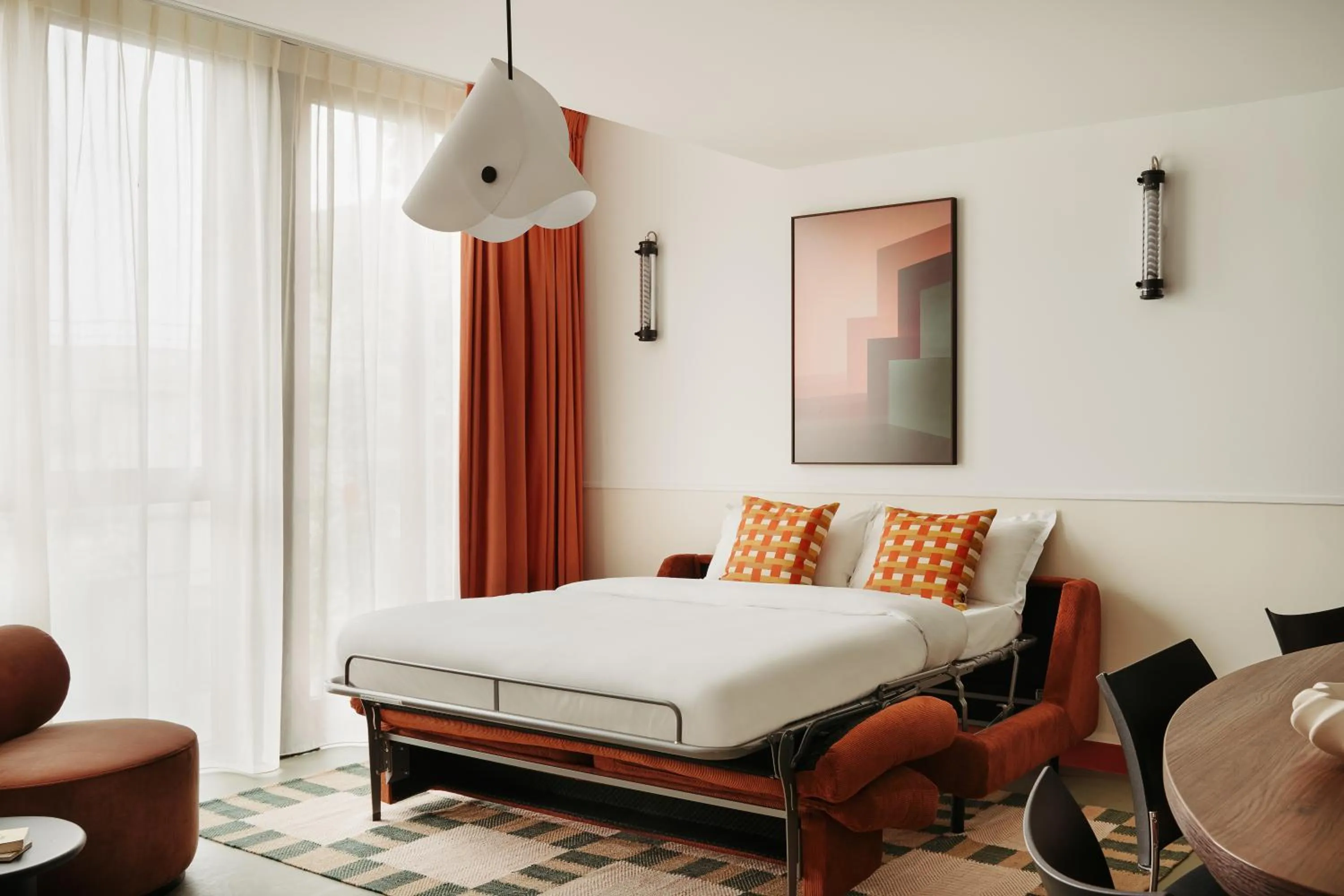 Living room, Bed in Edgar Suites Montrouge