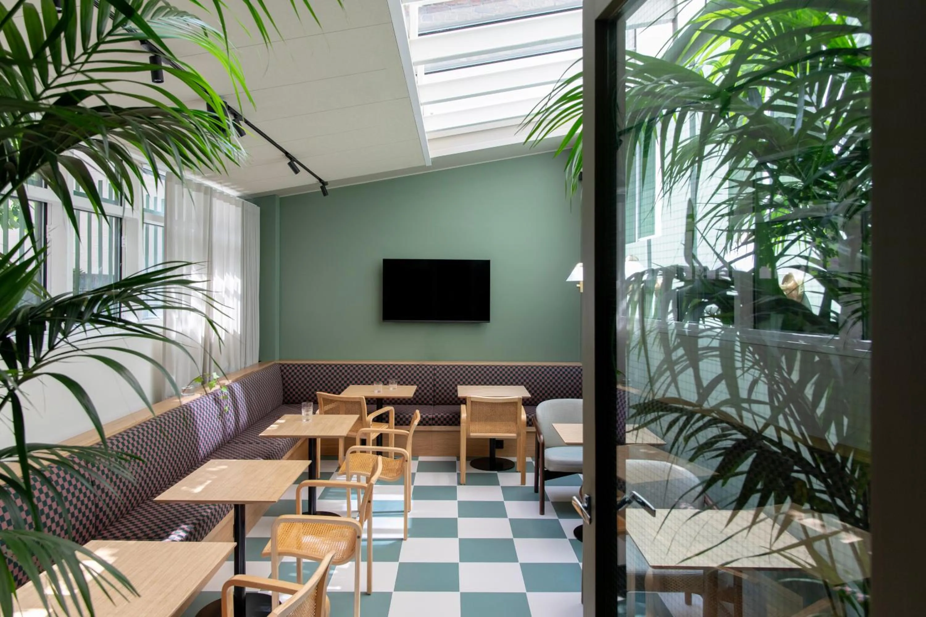 Communal lounge/ TV room in Bob W Helsinki Kaarti