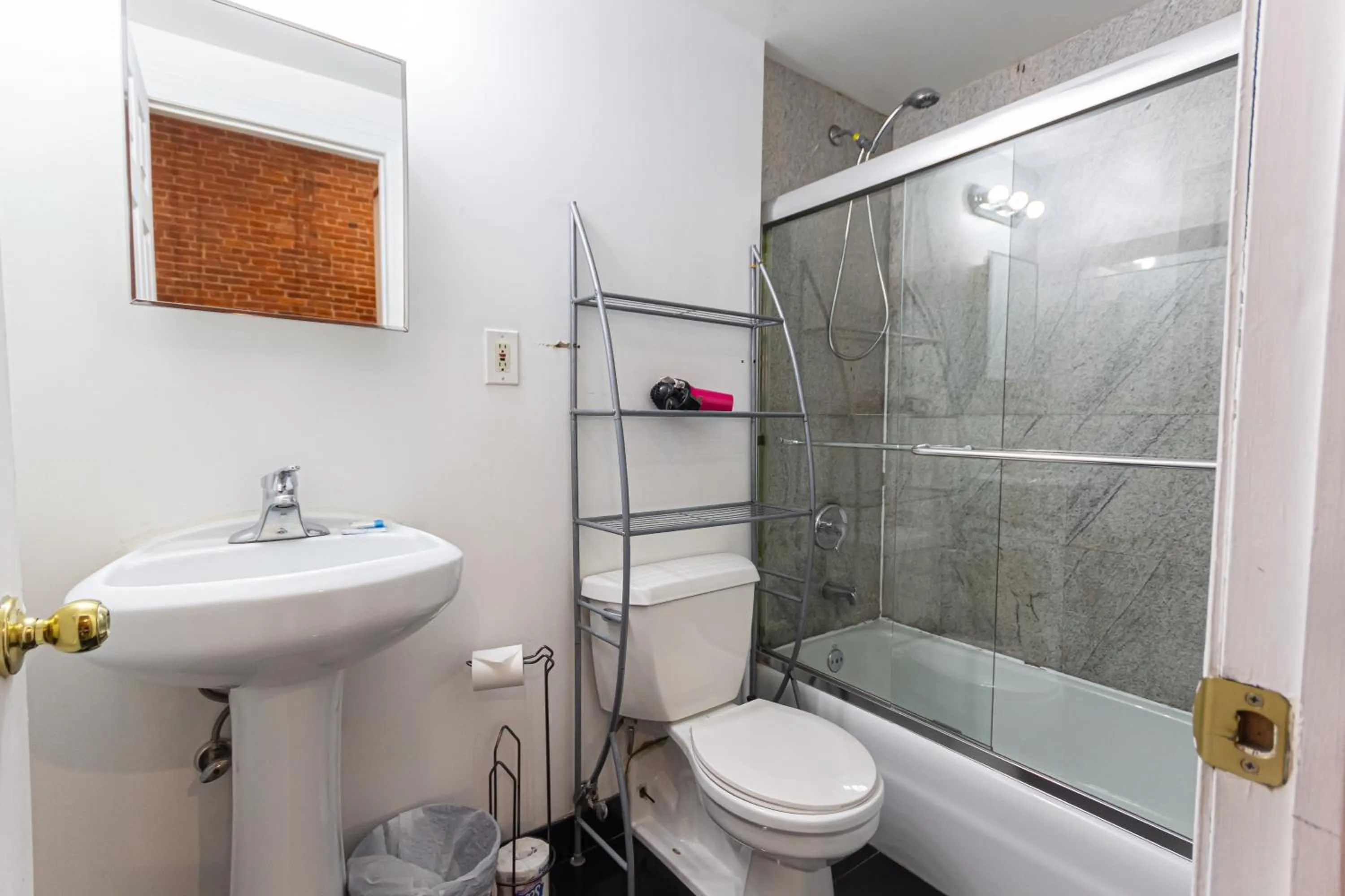 Bathroom in Studio Plus - Cozy Apartments