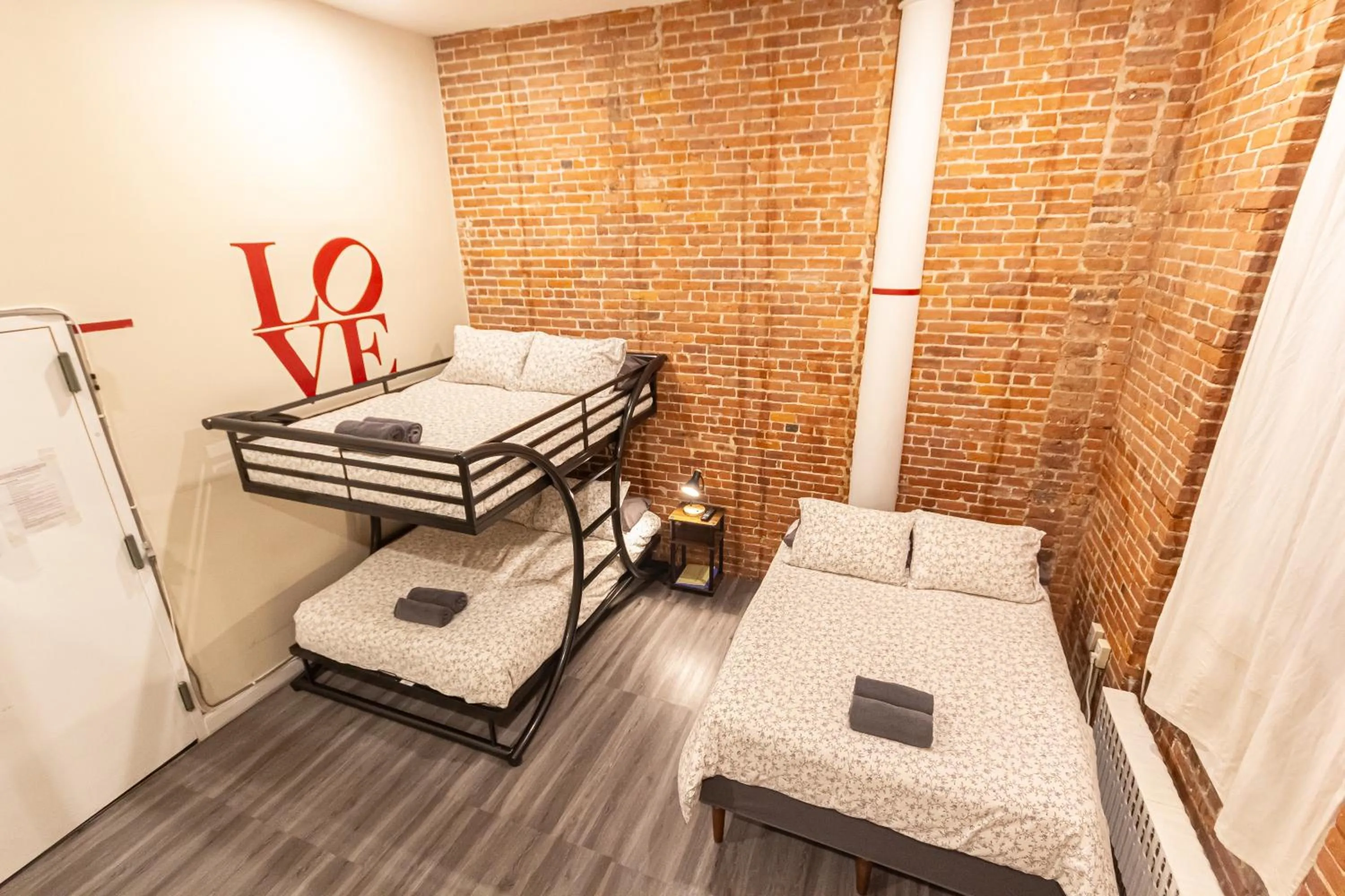 Bed in Studio Plus - Cozy Apartments