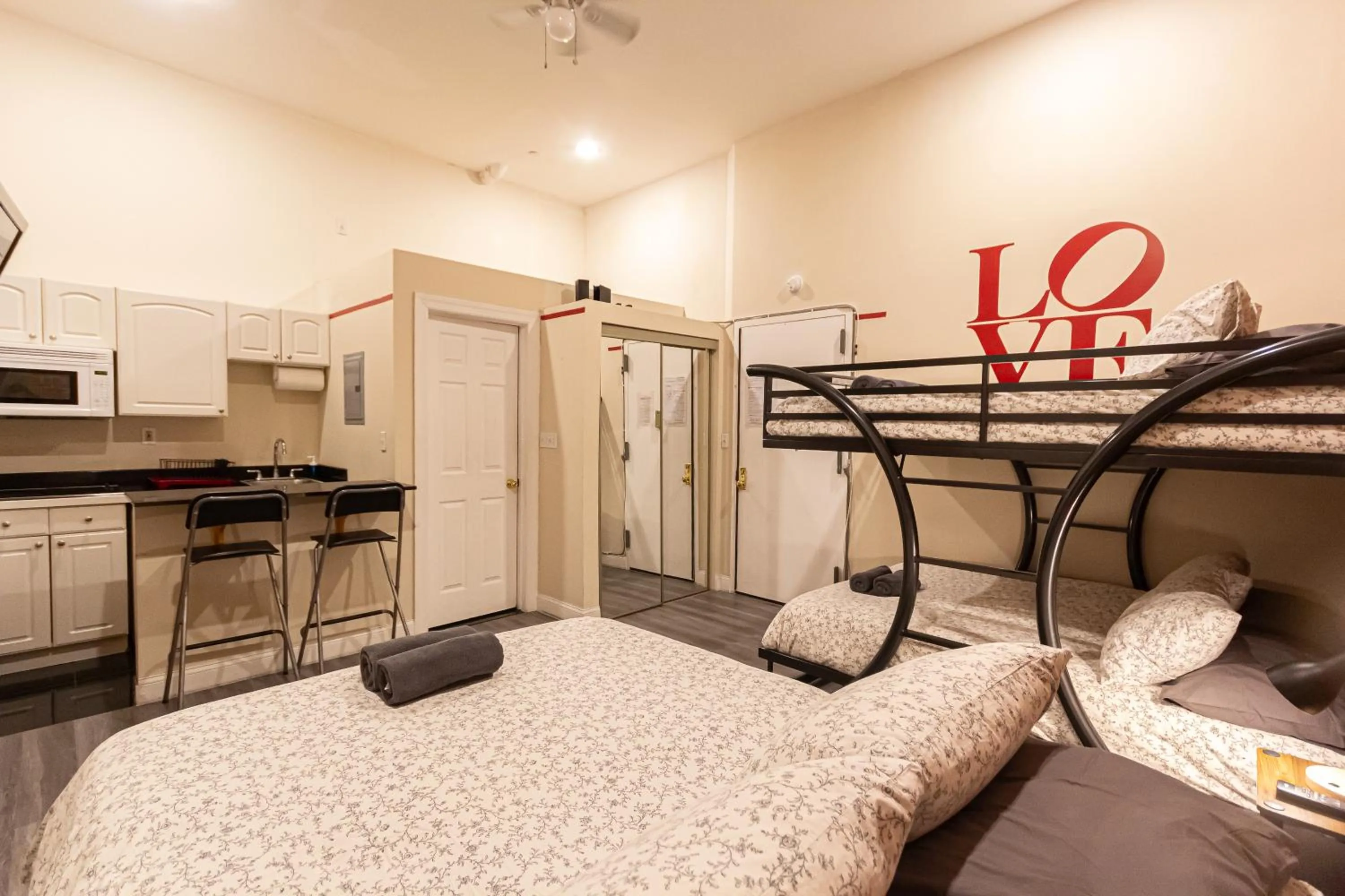 Bed in Studio Plus - Cozy Apartments