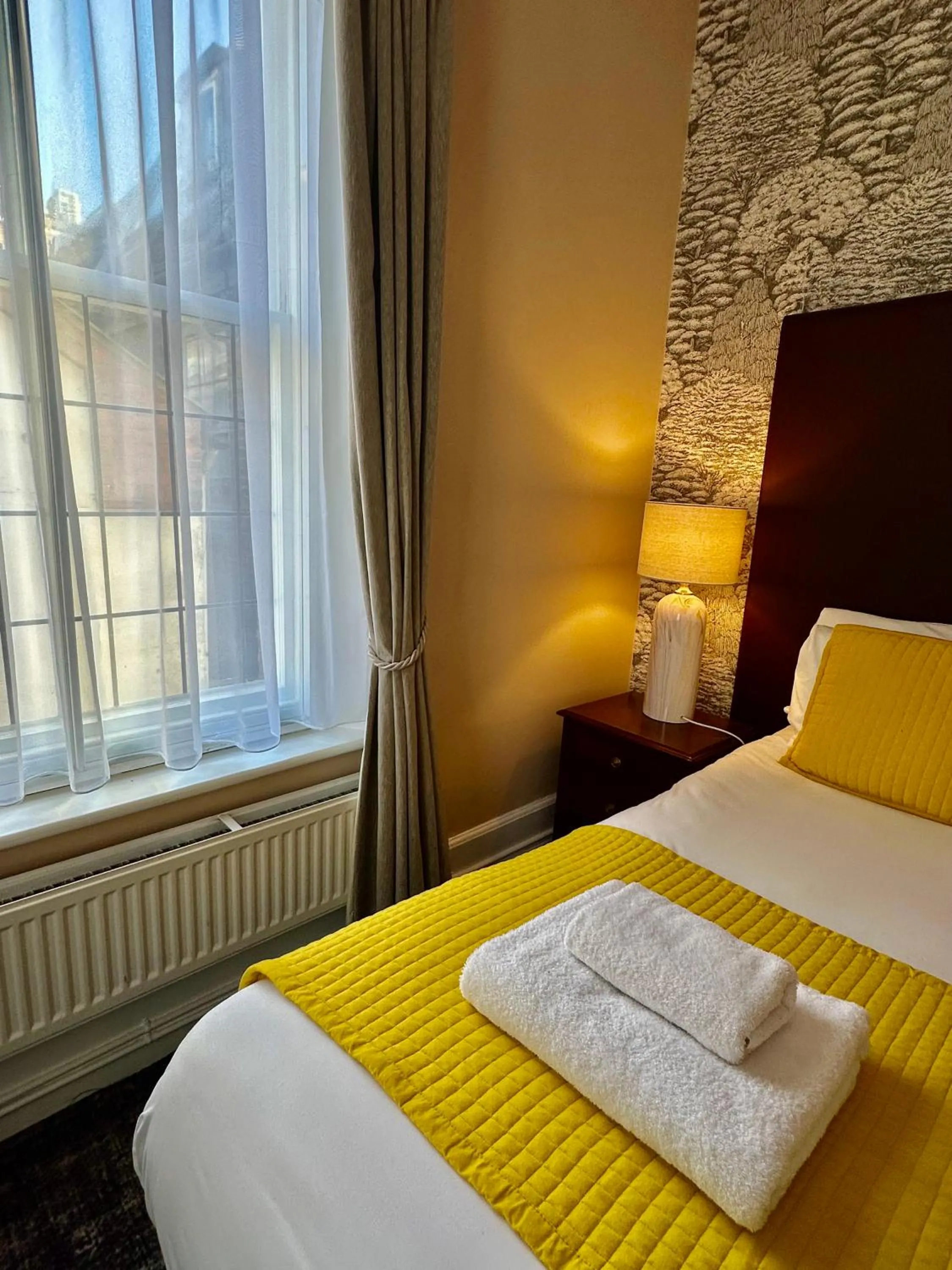 Bed in The Red Cow - Guest House