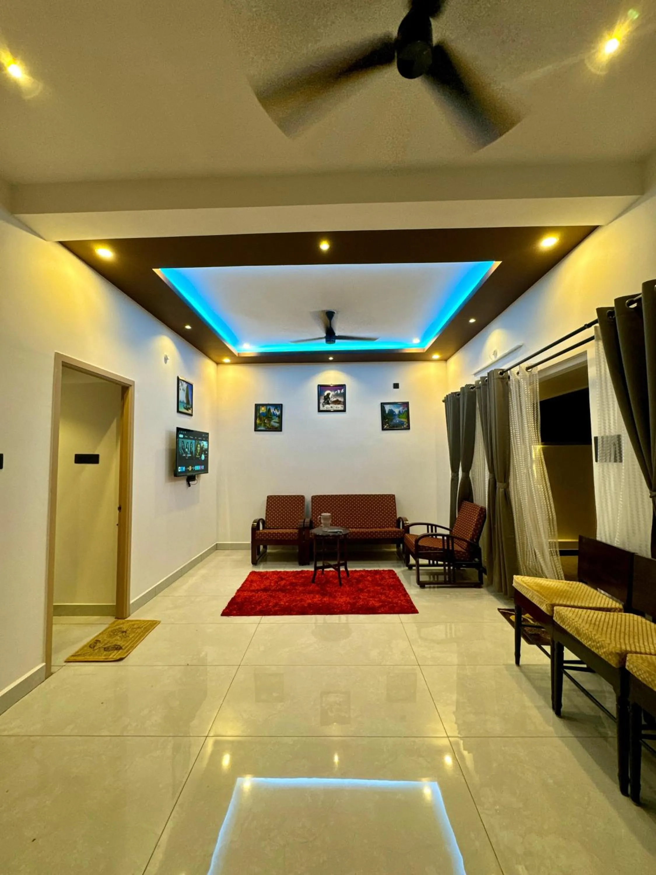 Living room in ECR Holidays Lavish Homestay