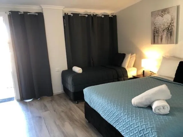 Bed in Jackie Howe Motel