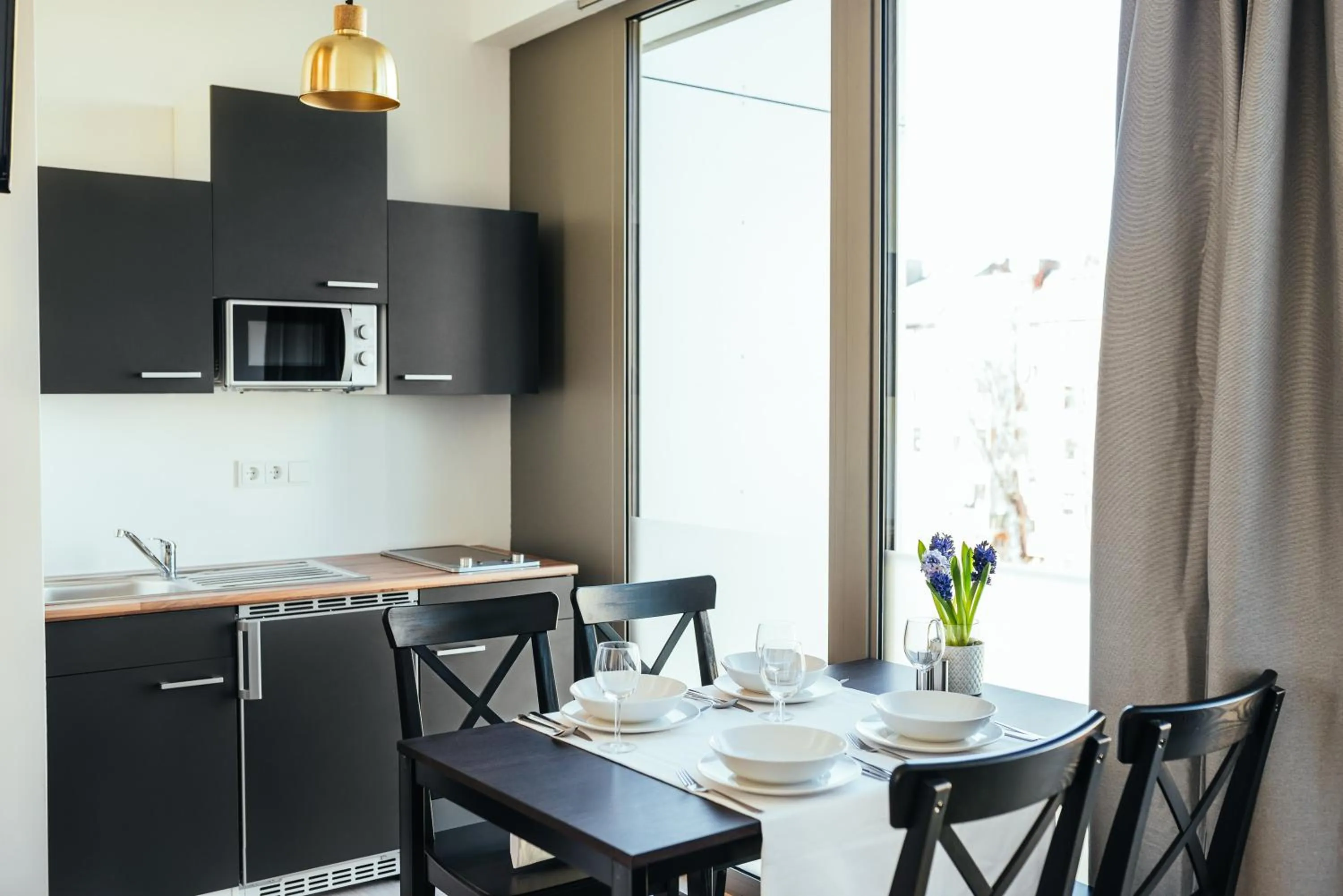 Kitchen or kitchenette in The Rix Studios & Suites