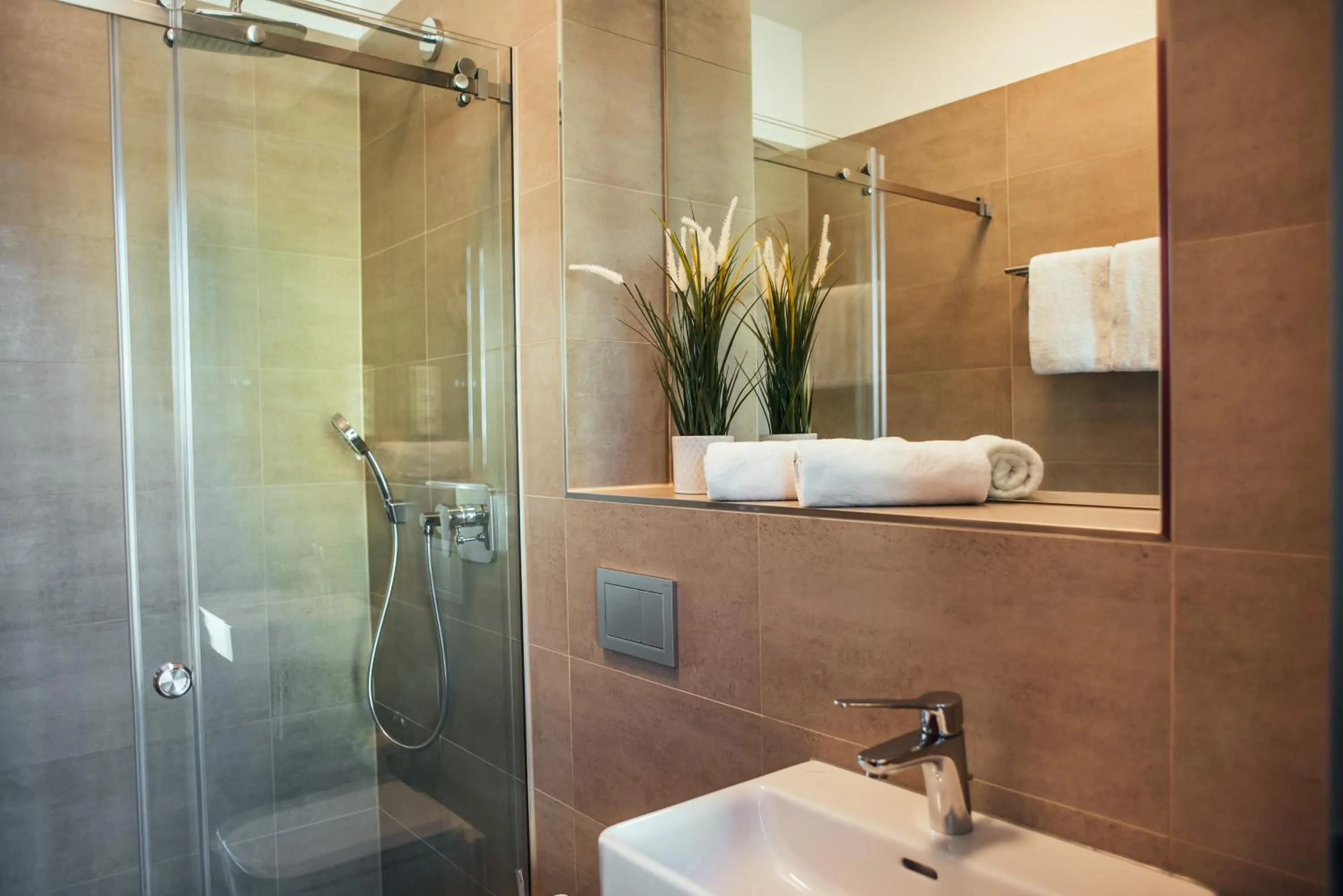 Shower in The Rix Studios & Suites