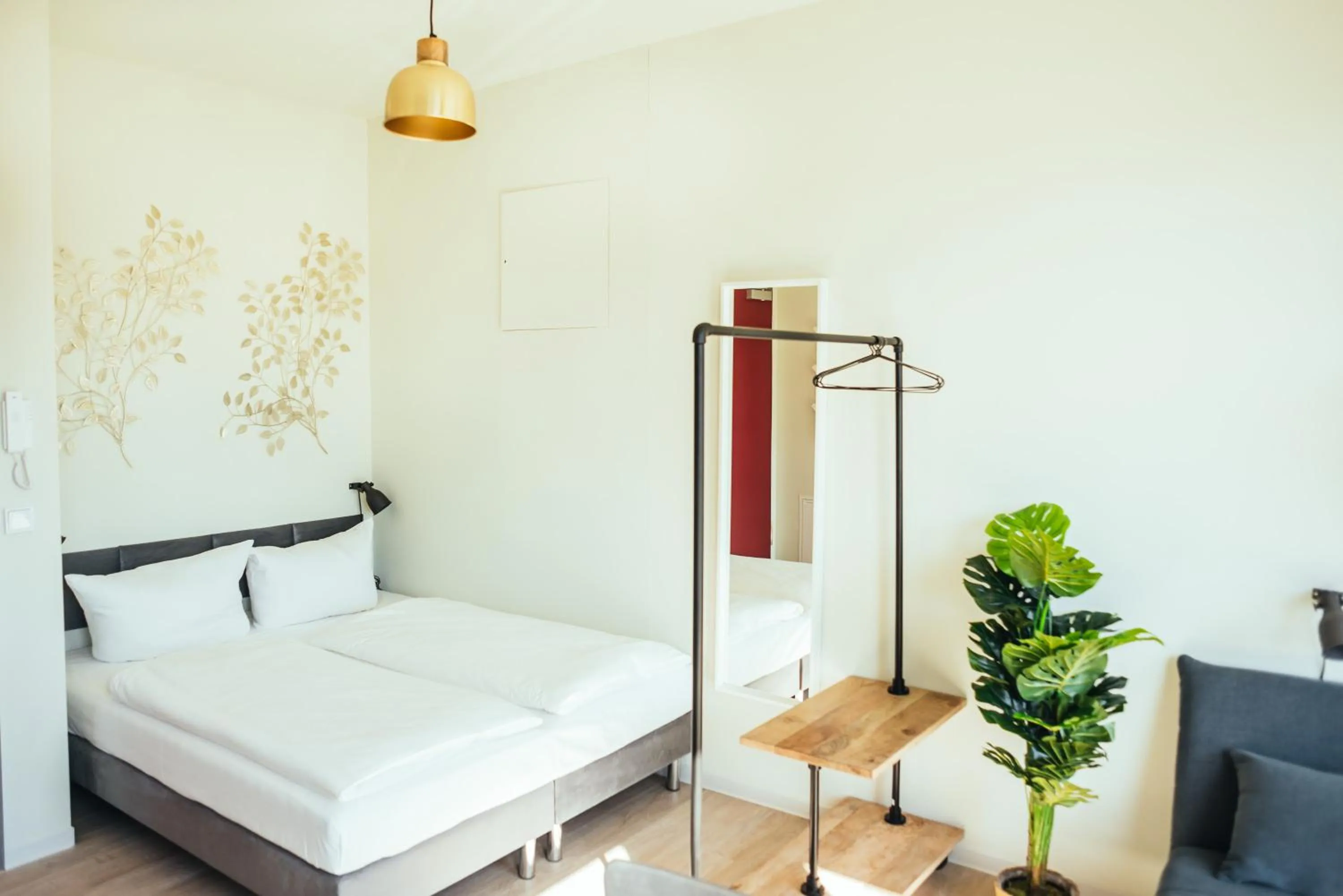 Bed in The Rix Studios & Suites