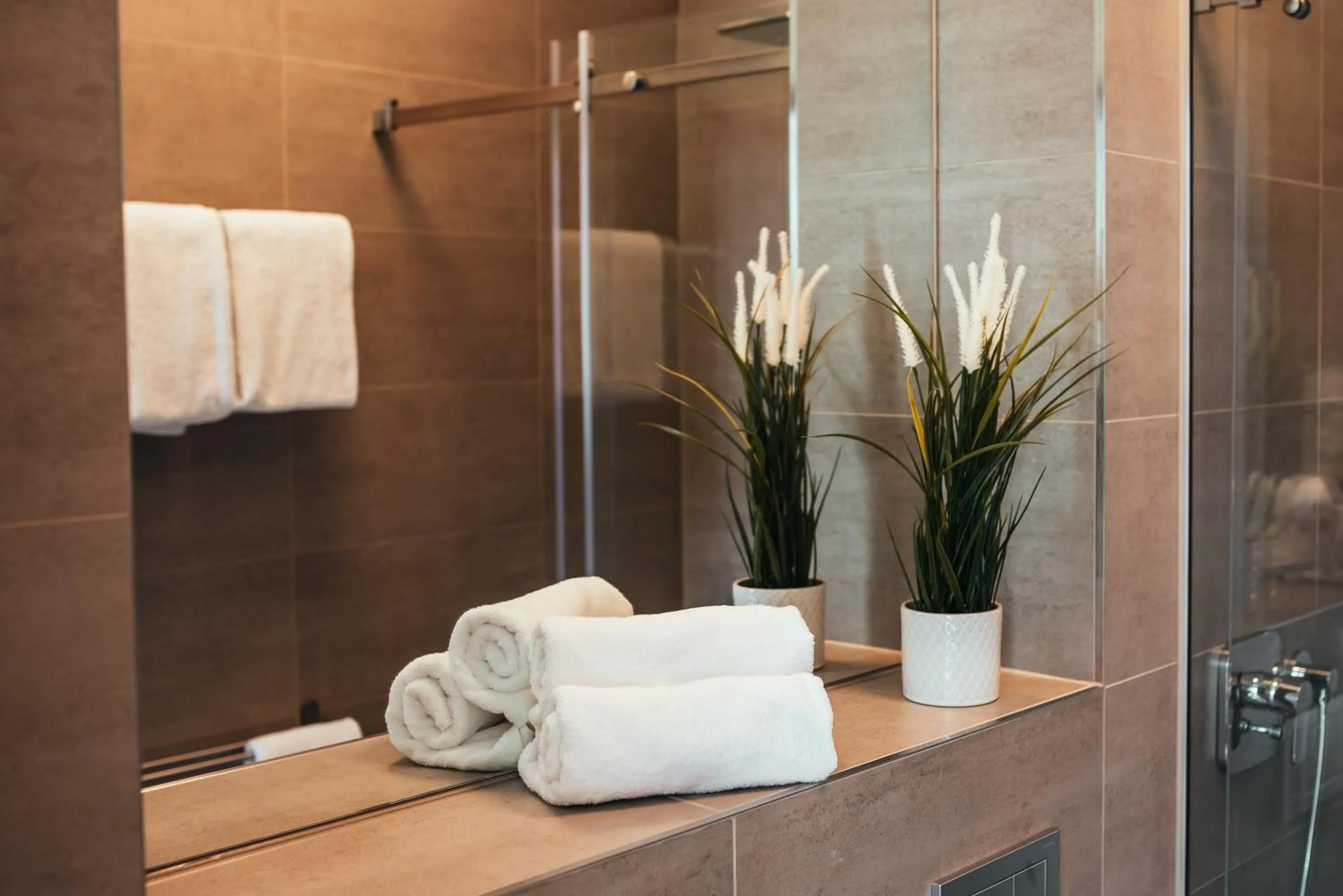 Shower in The Rix Studios & Suites