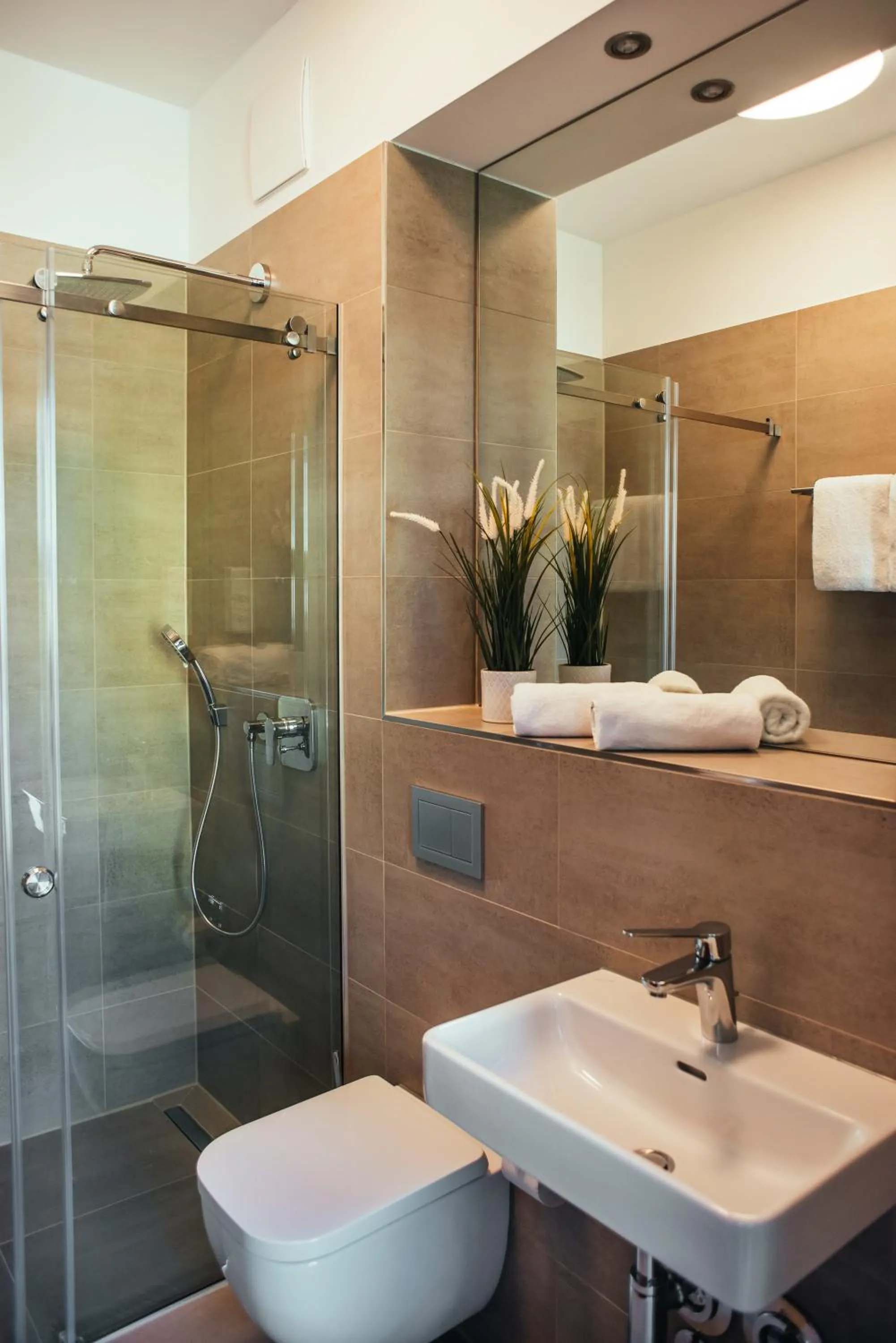 Shower in The Rix Studios & Suites